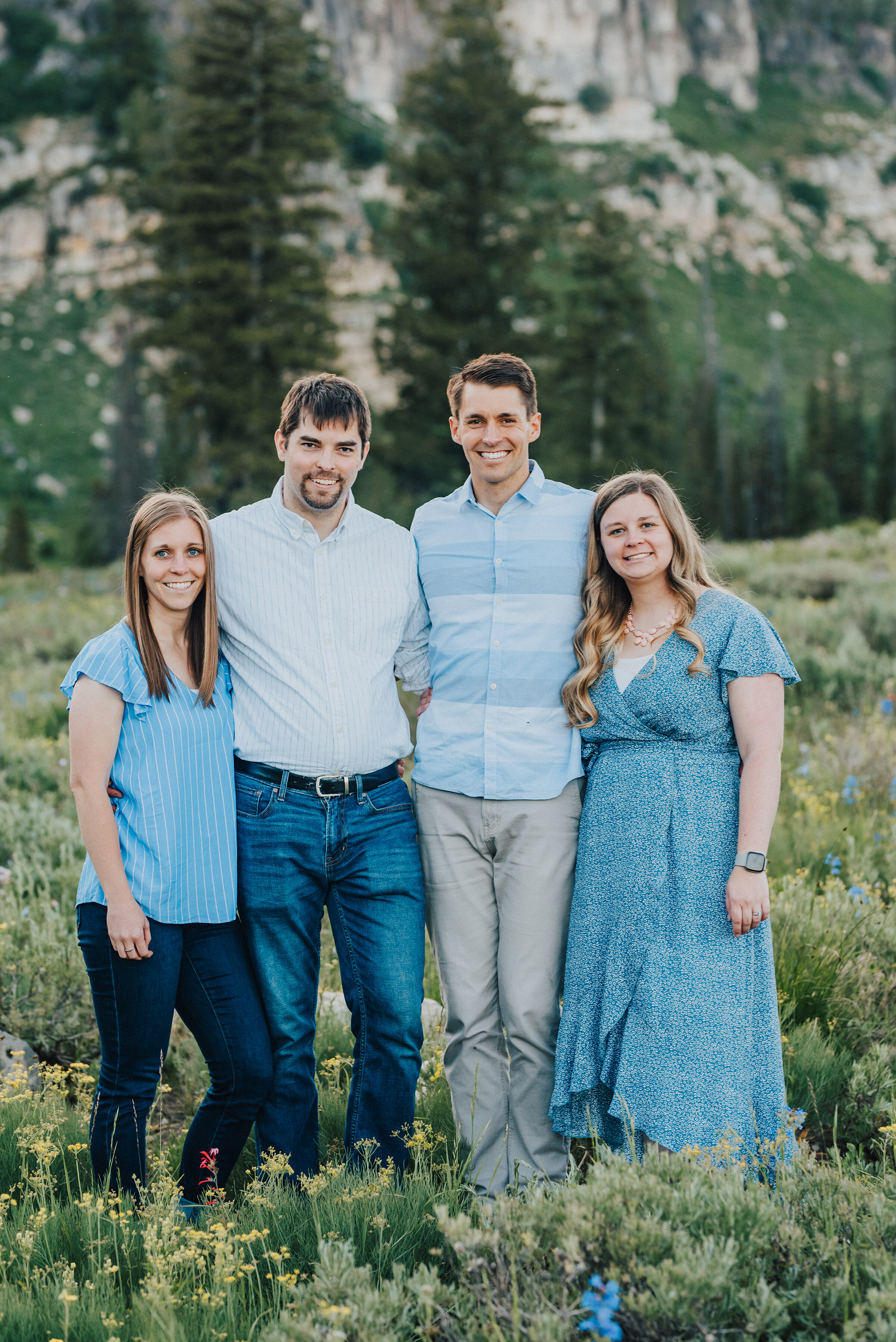  Loving siblings during this family photoshoot up Logan canyon at Tony Grove. Logan Utah family photographer Kristi Alyse photography Tony Grove forest nature photos Logan canyon light blue family photos wild flowers grand parents children parents spouses reunited dreamy scenic photo shoot #kristialysephotography #utahphotographer #familyphotography #logancanyon #familyphotos #forest #wildflowers #northernutah #familyportraits #family 