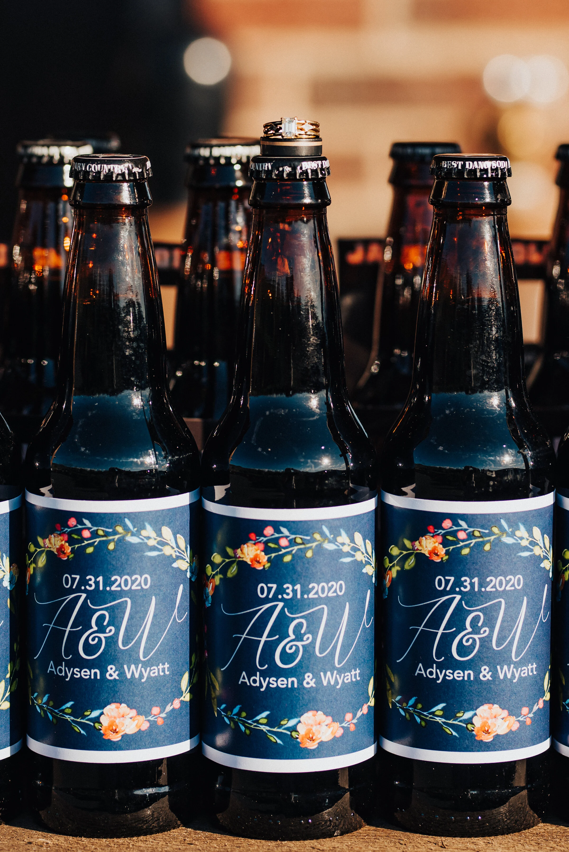  Adorable wedding favors at this backyard wedding reception in Park City. Kristi Alyse Photography Logan Utah photographer Park City wedding photographer Drive-Thru wedding COVID wedding neon signs socially distant wedding bride and groom soda weddin