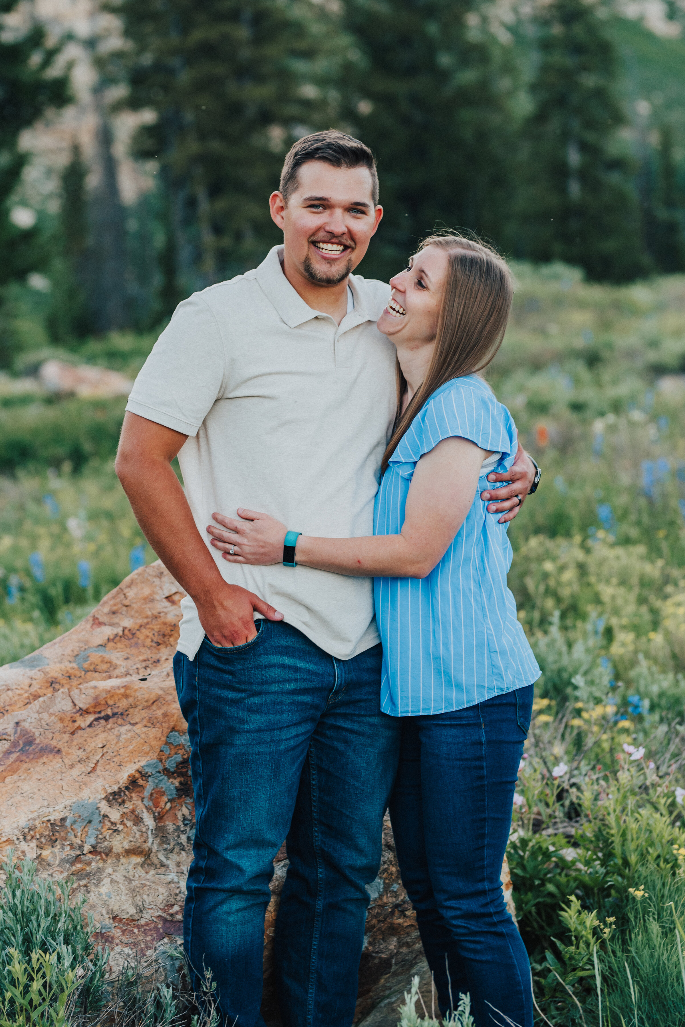  Cheerful couple during this dreamy family photoshoot up Logan Canyon at Tony Grove. Logan Utah family photographer Kristi Alyse photography Tony Grove forest nature photos Logan canyon light blue family photos wild flowers grand parents children parents spouses reunited dreamy scenic photo shoot #kristialysephotography #utahphotographer #familyphotography #logancanyon #familyphotos #forest #wildflowers #northernutah #familyportraits #family 