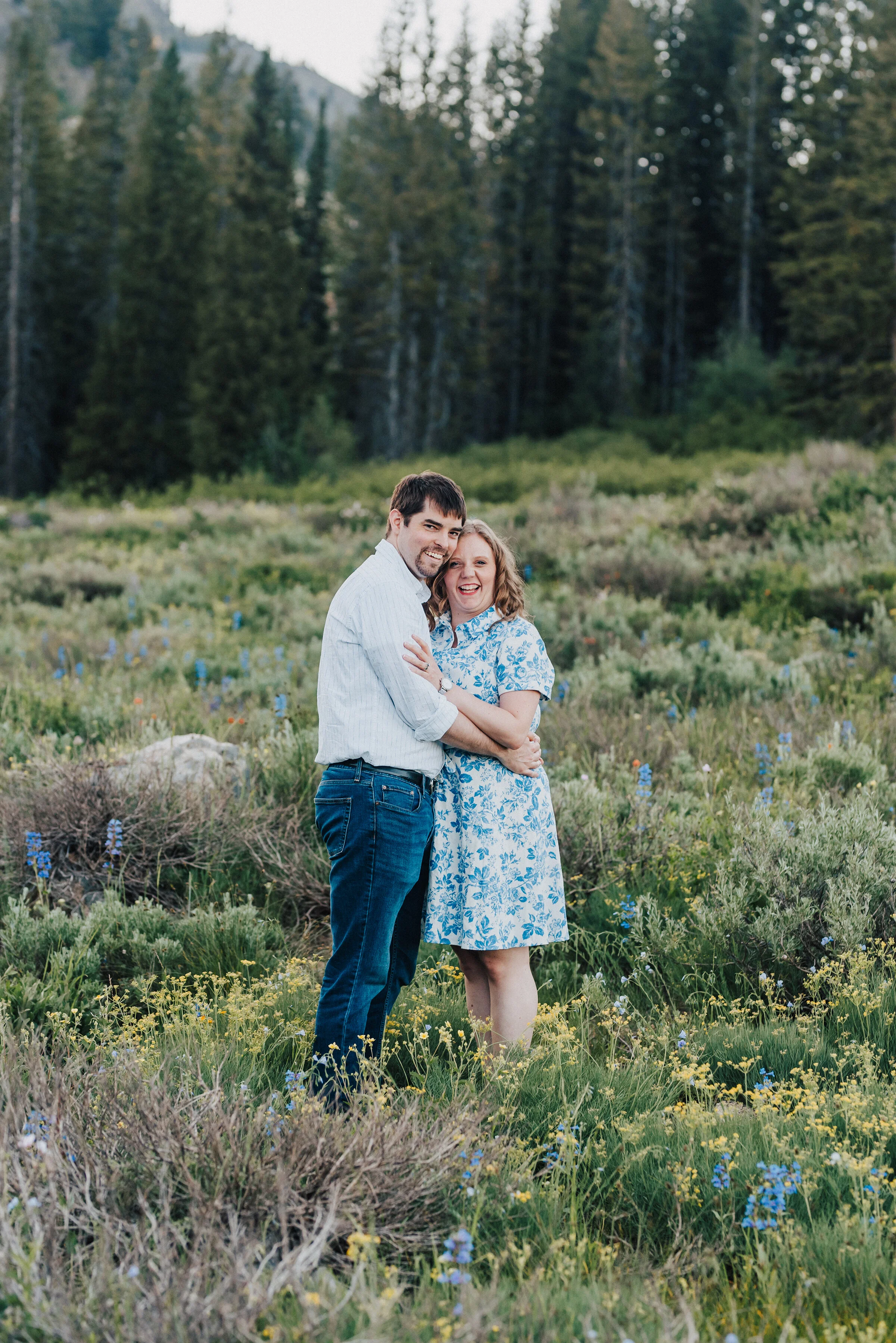  Lovely couple at this gorgeous meadow up Logan canyon for this dreamy family photo session. Logan Utah family photographer Kristi Alyse photography Tony Grove forest nature photos Logan canyon light blue family photos wild flowers grand parents chil