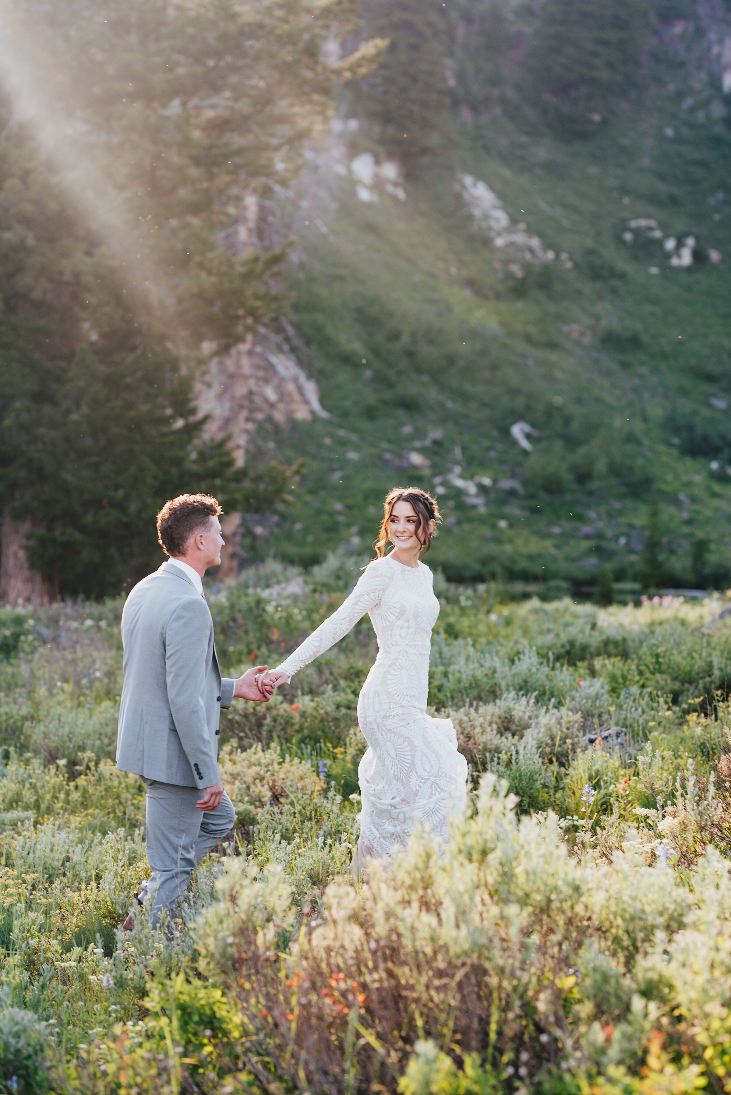  Leading with love in this dreamy picturesque setting up Logan canyon. Kristi Alyse photography Logan Utah wedding photographer forest nature dreamy formals Logan canyon Tony Grove scenic bridals Northern Utah photographer Utah brides bride and groom