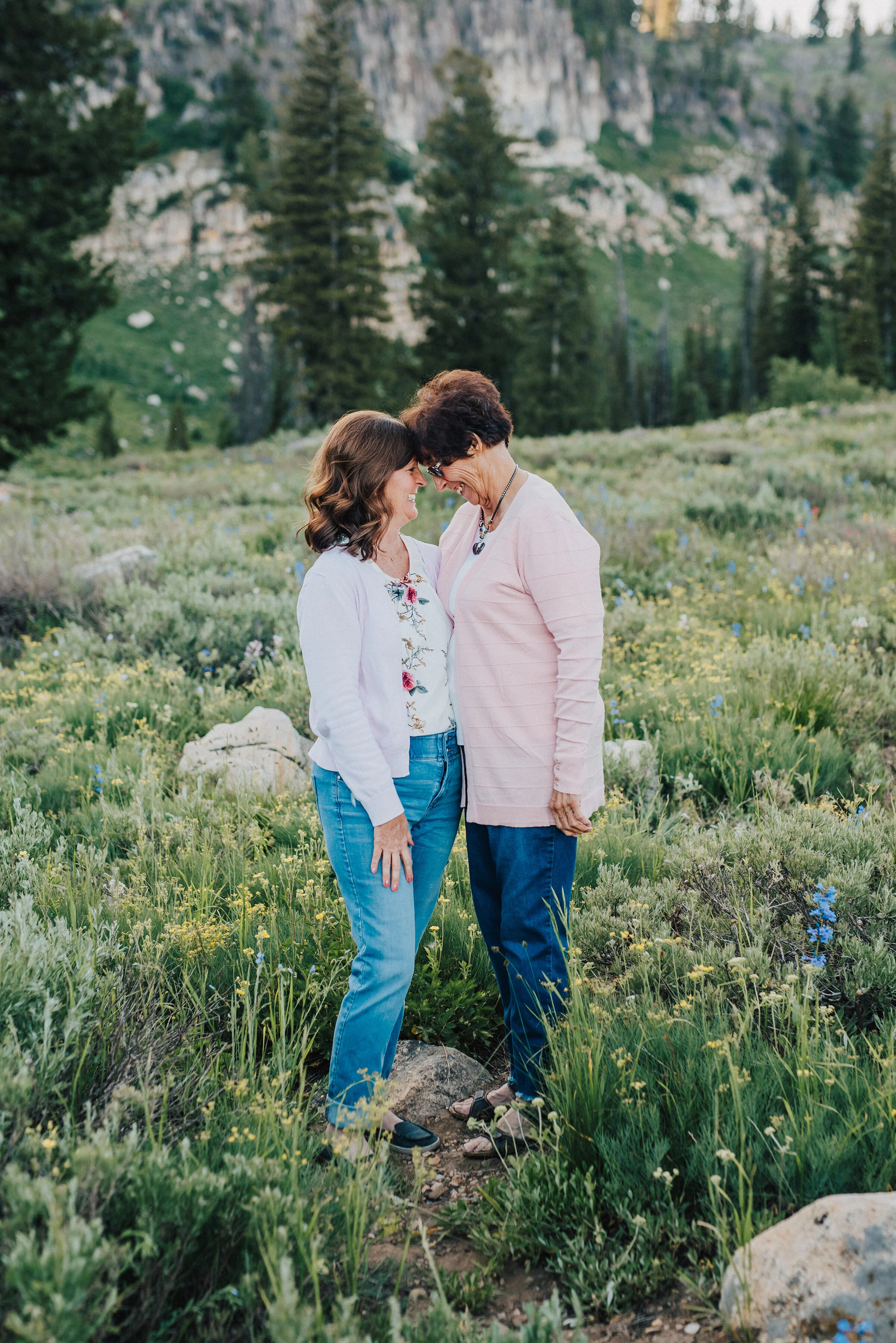  Sweetest grandmother and daughter embracing during this lovely family photo session at Tony Grove up Logan canyon. Logan Utah family photographer Kristi Alyse photography Tony Grove forest nature photos Logan canyon light blue family photos wild flo