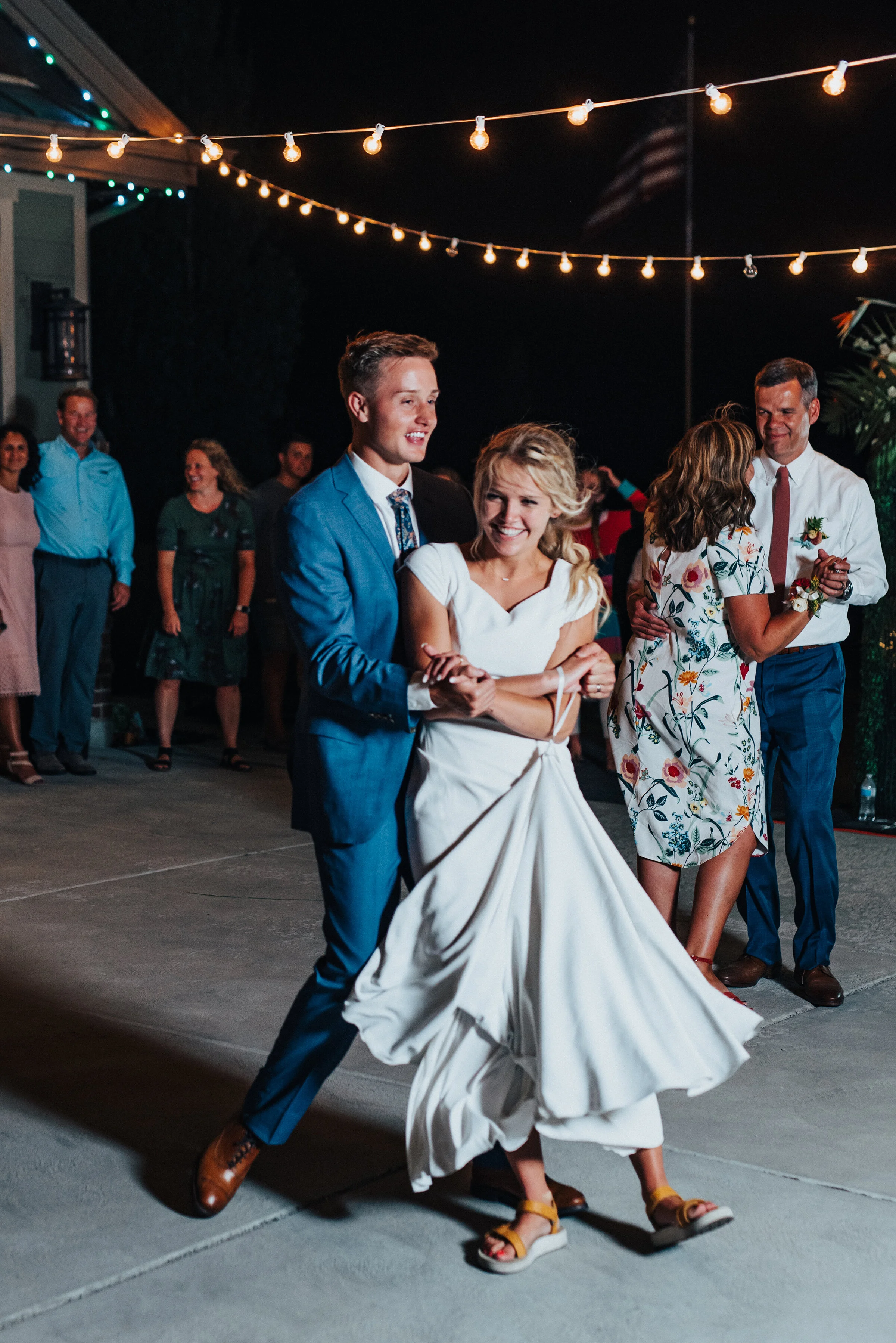  Dreamy first dance as Mr. and Mrs. at this charming backyard wedding in Park City. Kristi Alyse Photography Logan Utah photographer Park City wedding photographer Drive-Thru wedding COVID wedding neon signs socially distant wedding bride and groom f