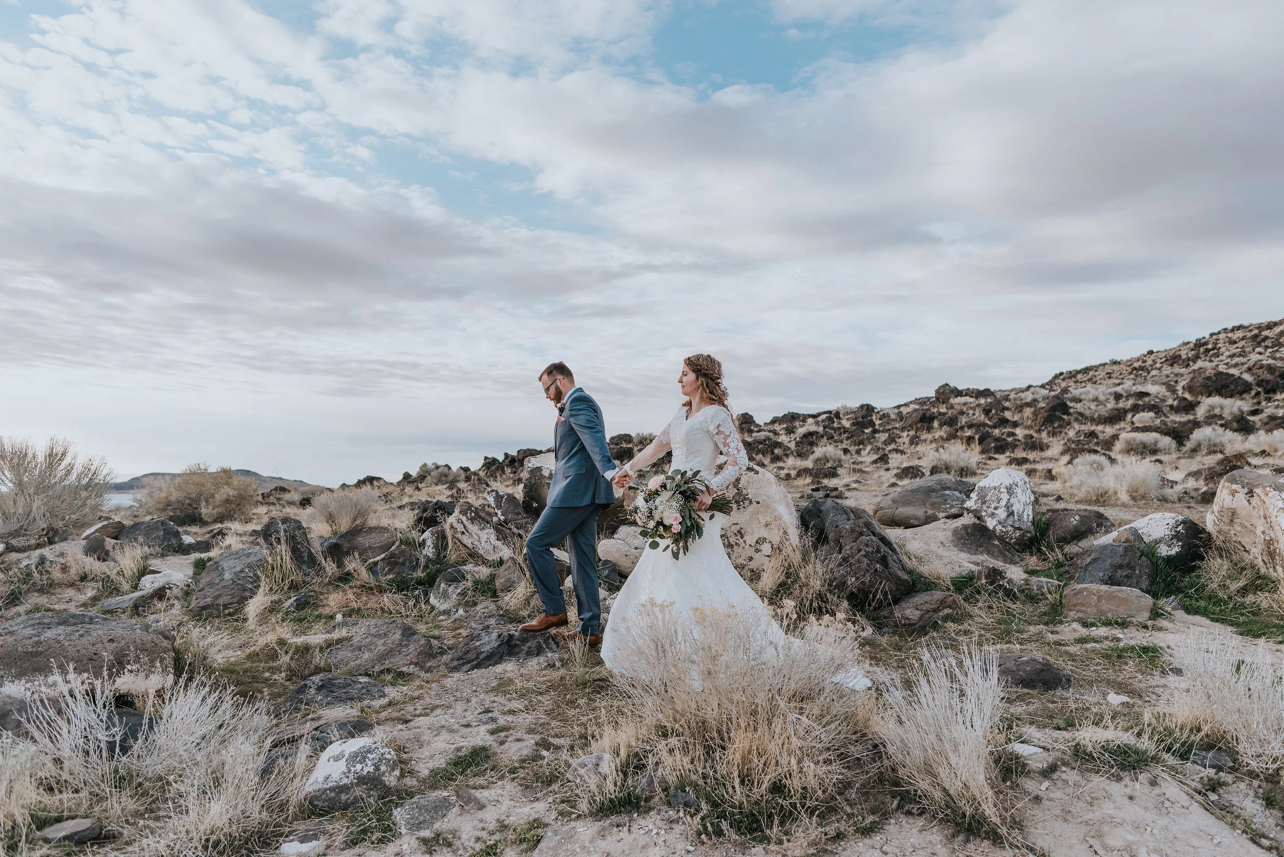 The natural beauty of the Spiral Jetty was complete with dimension and layers much like this stunning bride and groom during their wedding formals. wedding formal photoshoot in Spiral Jetty Northern Utah Great Salt Lake photography wedding formals n…