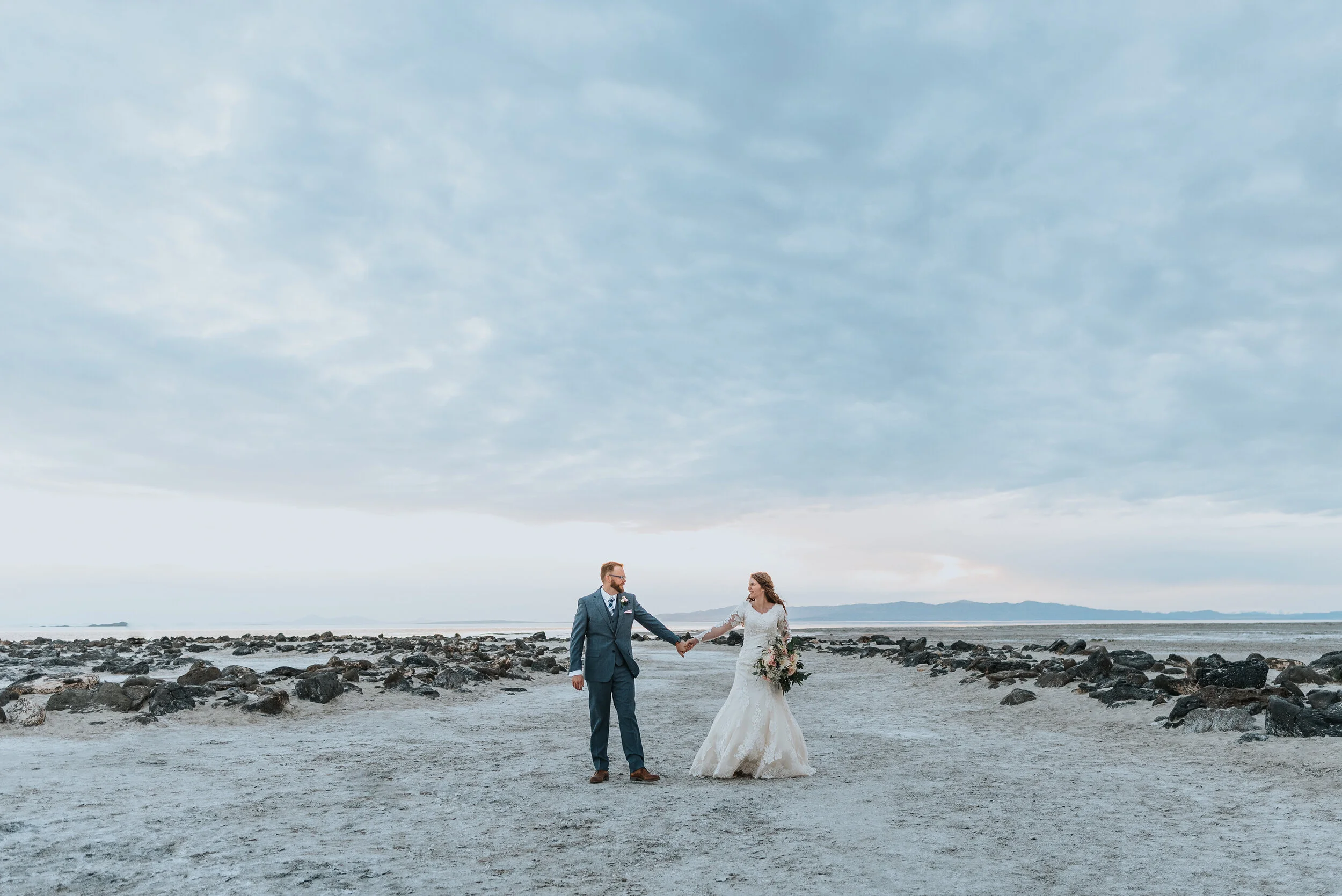 Wedding formal photoshoot in Spiral Jetty Northern Utah Great Salt Lake photography wedding formals natural photo aesthetic bride and groom #spiraljetty #utahphotography #weddingformals #gettingmarried #weddingattire #utahwedding #greatoutdoorsweddi…