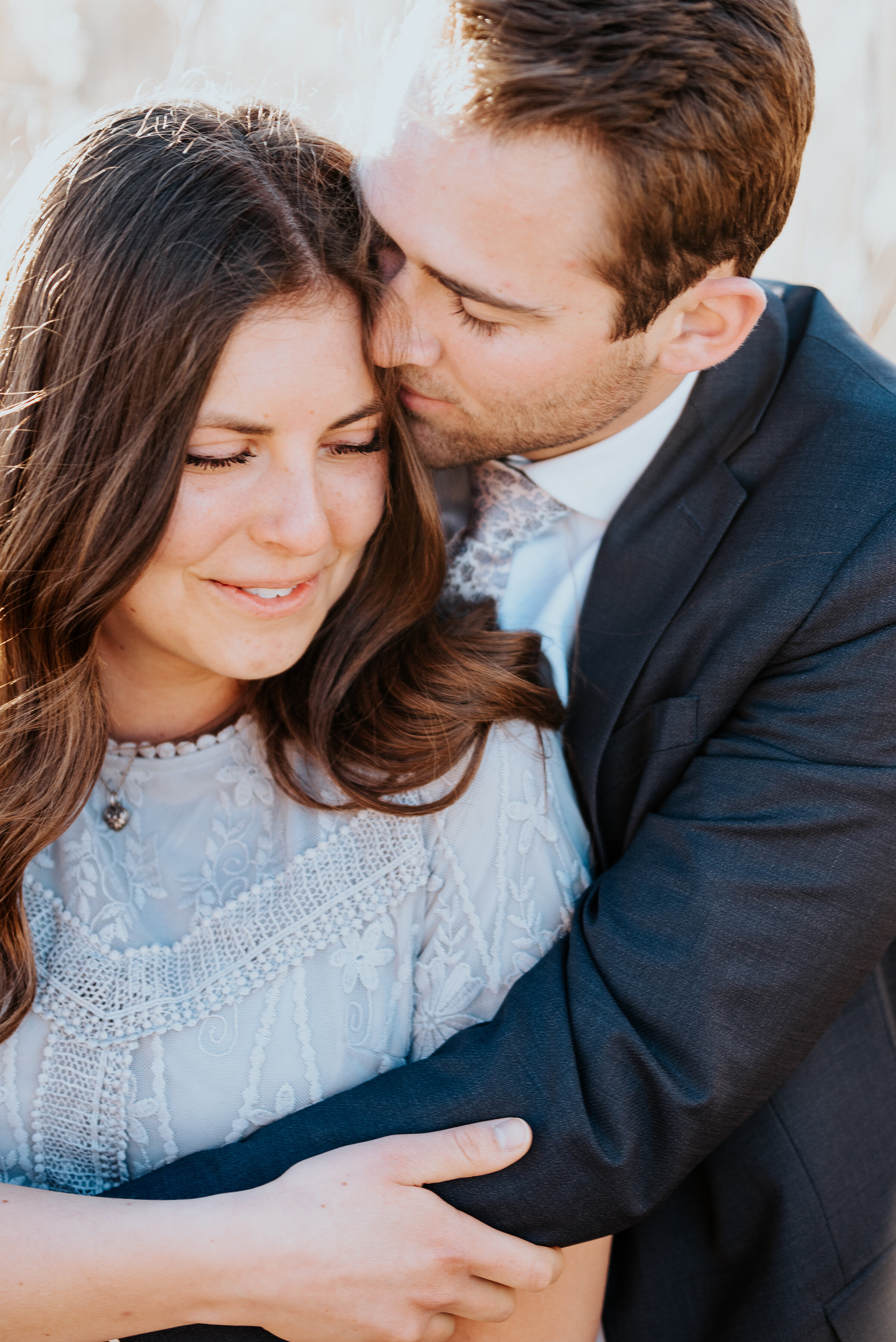  Man kisses his future brides hair in a stunning engagement photo perfect for a custom guest book. Photos by Kristi Alyse Photography stunning engagement inspiration engagement hair ideas formal engagement photoshoot #weddinginspo #engagementinspo #kristialysephotography #hairideas #futurebride #futuregroom #engagementphotos #kristialysephotography #formalengagement #bestphotographer #stunning 