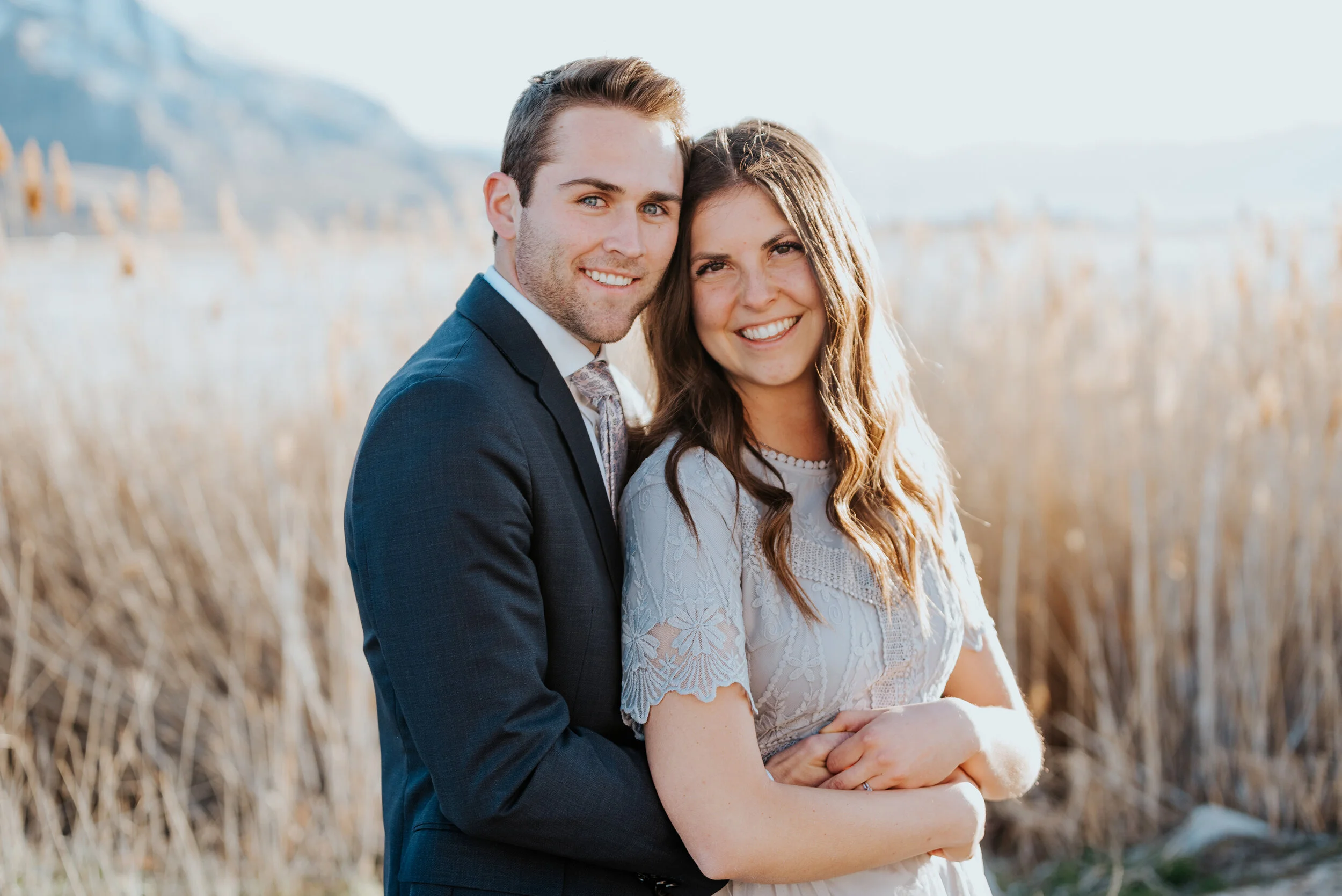  Formal engagement photoshoot in outdoors near Magna Utah with Kristi Alyse Photography. Formal engagement session with smiling couple couple poses that create stunning engagement photos picture perfect Kristi Alyse Photography outdoor nature engagem