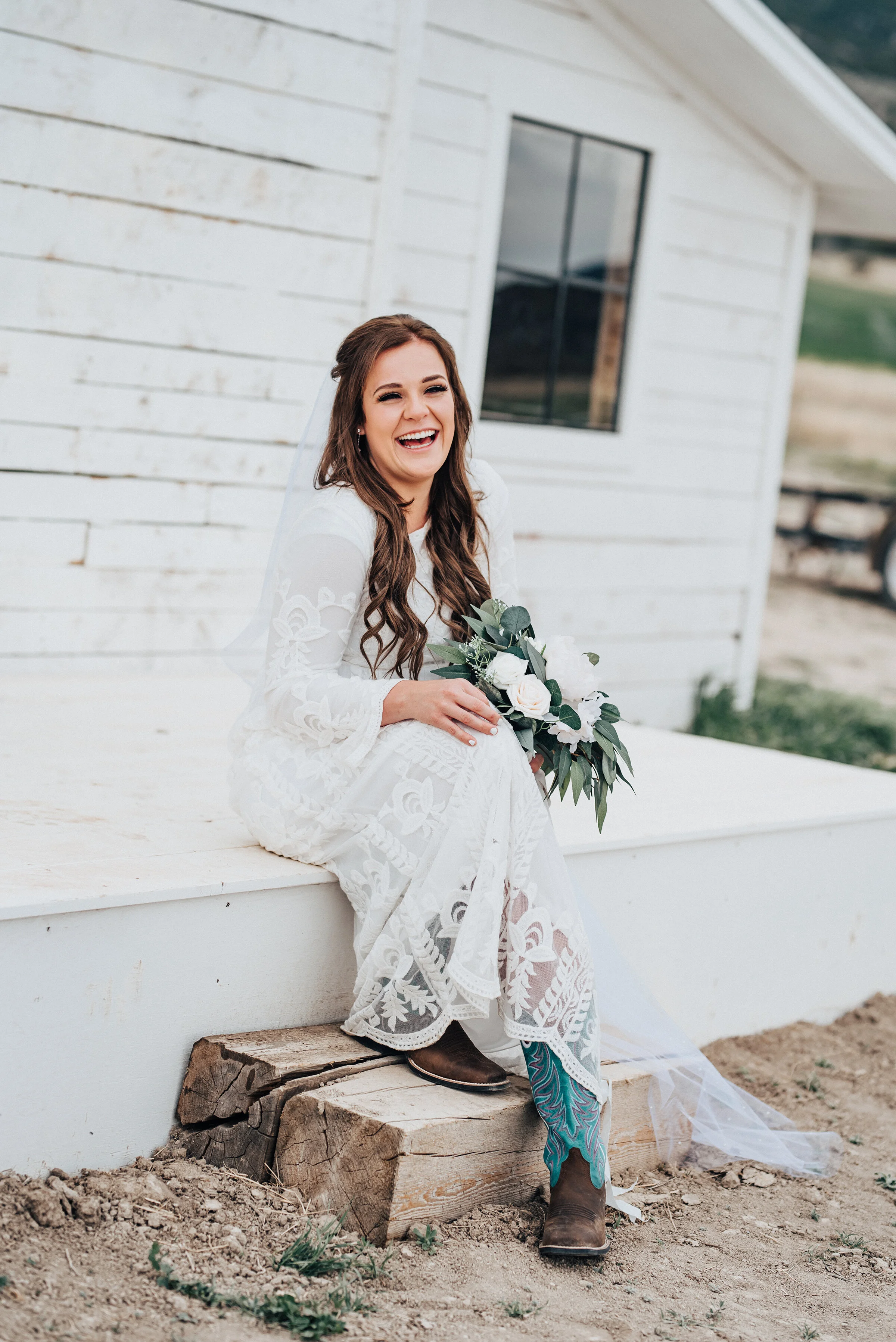  The details in this brides wedding gown all the way down to her festive western cowgirl boots were special and unique for this bride. Wedding day photoshoot in Ephraim Utah photography wedding outdoor location western inspired rustic Airbnb photo ae