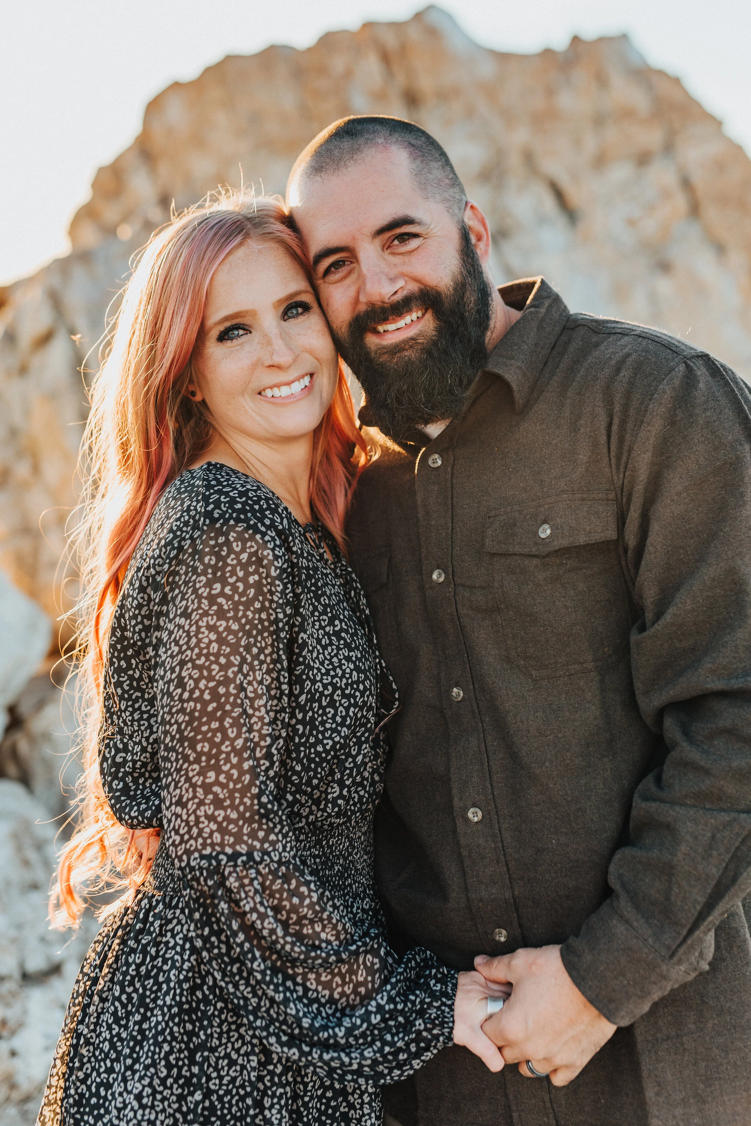  Husband and wife hold hands in a stunning Antelope Island family photo shoot session by professional Utah photographer Kristi Alyse Photography. Couple goals couple pose inspiration ideas and goals fall family photo shoot husband and wife goals husb