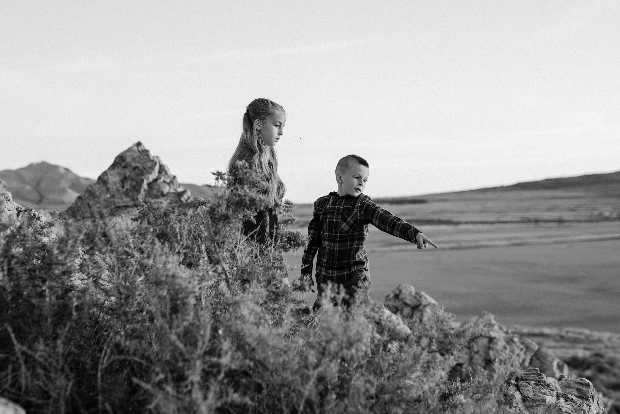  Brother and sister explore Antelope Island together in a unique and playful family photo shoot session by Kristi Alyse Photography. Fall goals brother and sister goals black and white photo shoot inspiration ideas and goals outdoor photo shoot aesth