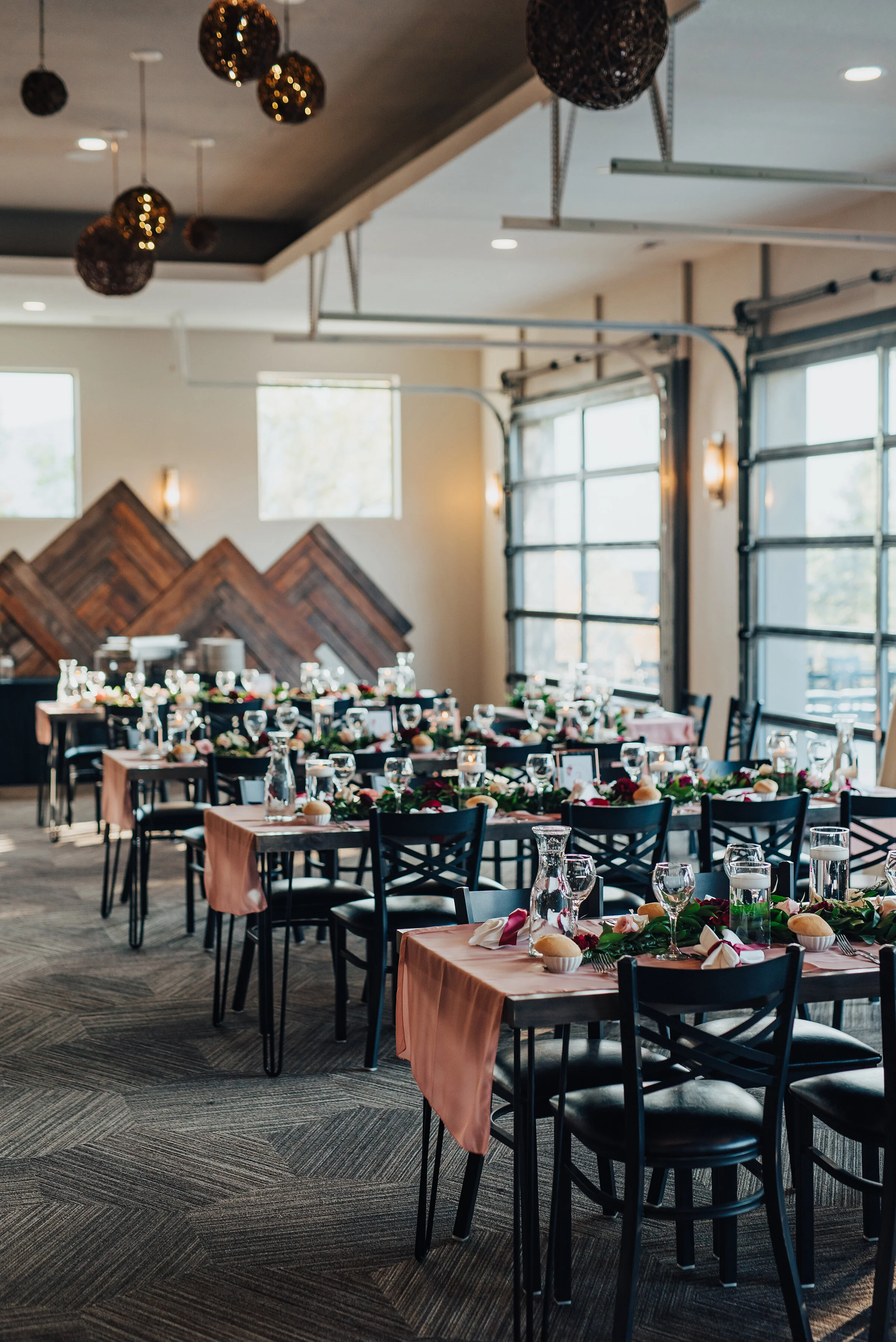  Gorgeous look at the before shot of a wedding luncheon in Logan, Utah by Kristi Alyse Photography. Luncheon table settings rehearsal dinner inspo greenery center pieces wine glasses pink tablecloth wedding day luncheon dinner details for the bride a