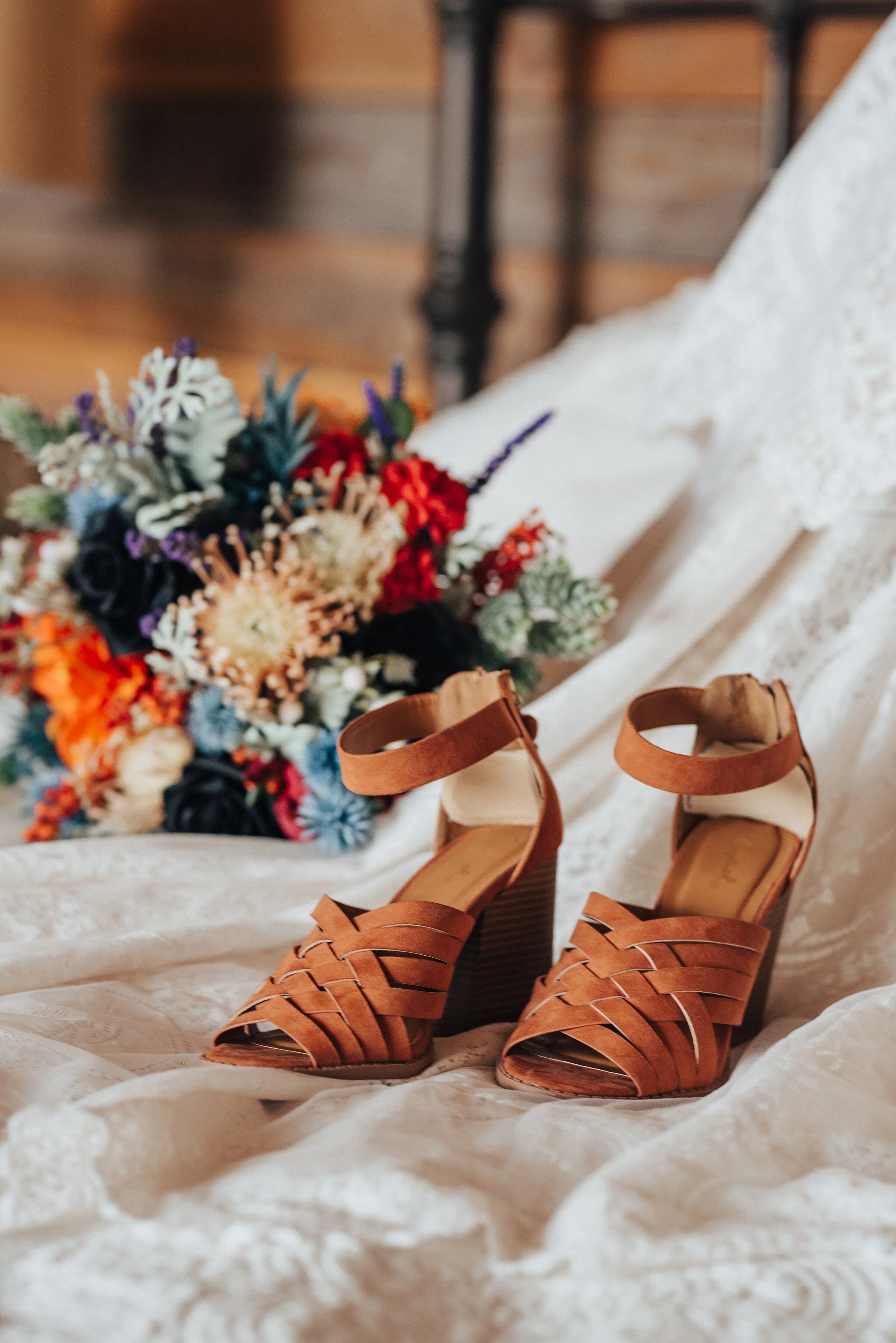  Bohemian cognac brown leather pumps with orange and purple bridal bouquet in this styled shoot by Kristi Alyse Photography in Northern Utah. logan utah wedding and family photographer meaningful photography quality photography boho wedding shoes lea