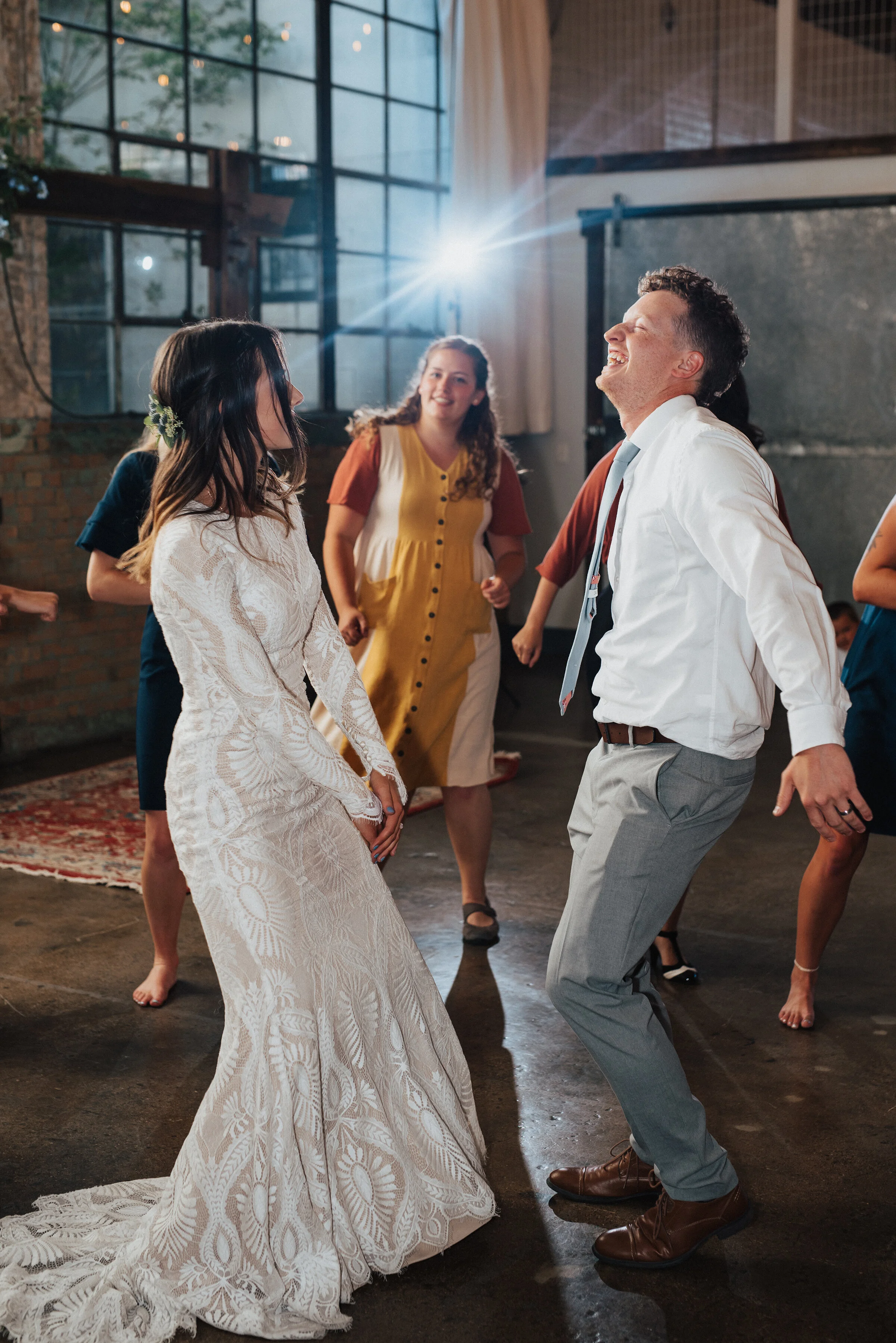  Kristi Alyse Photography is so talented at capturing authentic energy in photos and this one from a bohemian-styled wedding at the Bright Building in Provo, Utah is no exception. #ProvoUtahWeddingPhotographer #UtahValleyWeddingPhotographer #Bohemian