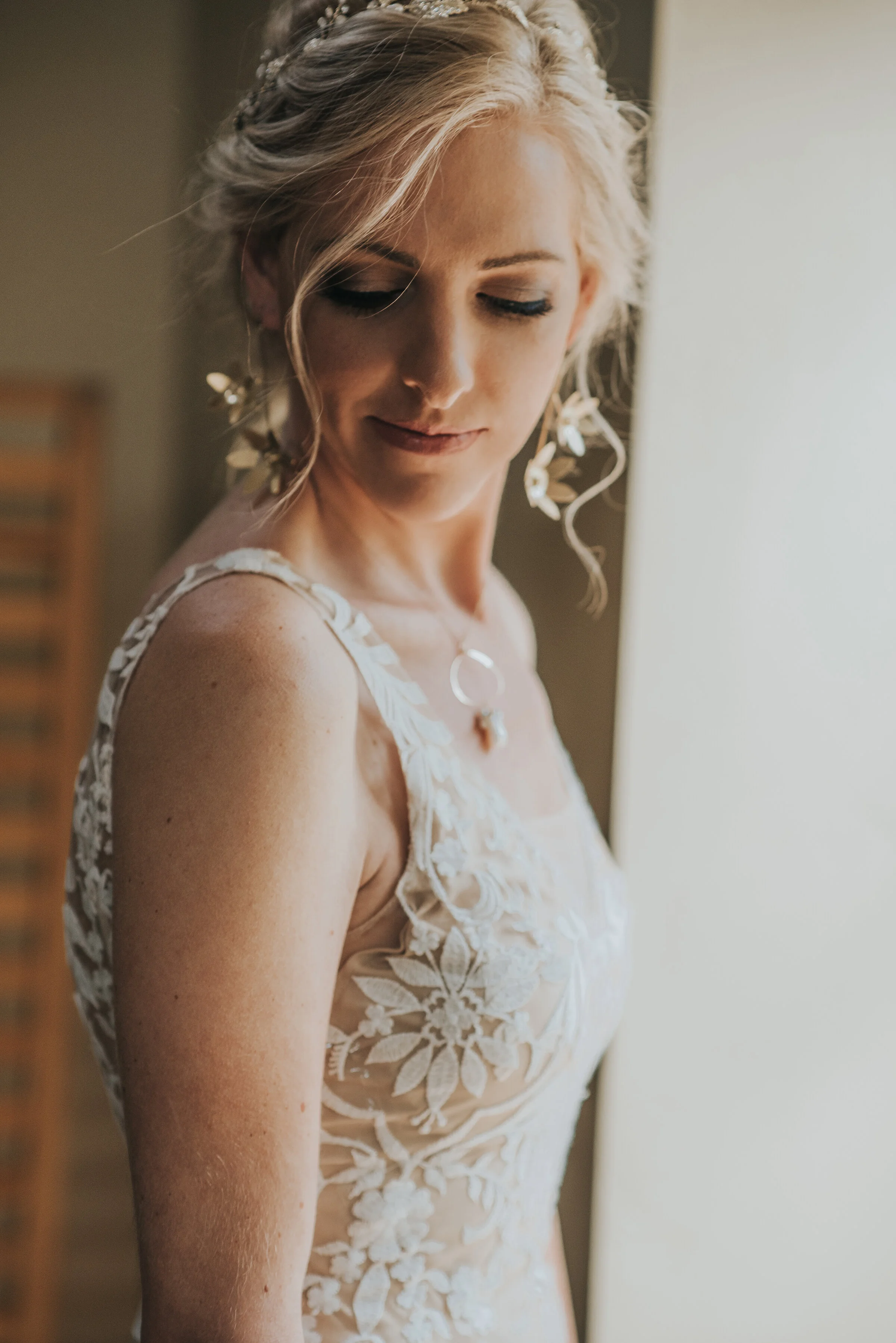  Beautiful bride with nude lace dress and floral patterns in a boho wedding in Salt Lake City by Kristi Alyse Photography. boho inspo for wedding dress ideas for wedding boho wedding dress nude wedding dress nude with lace wedding dress wedding venue