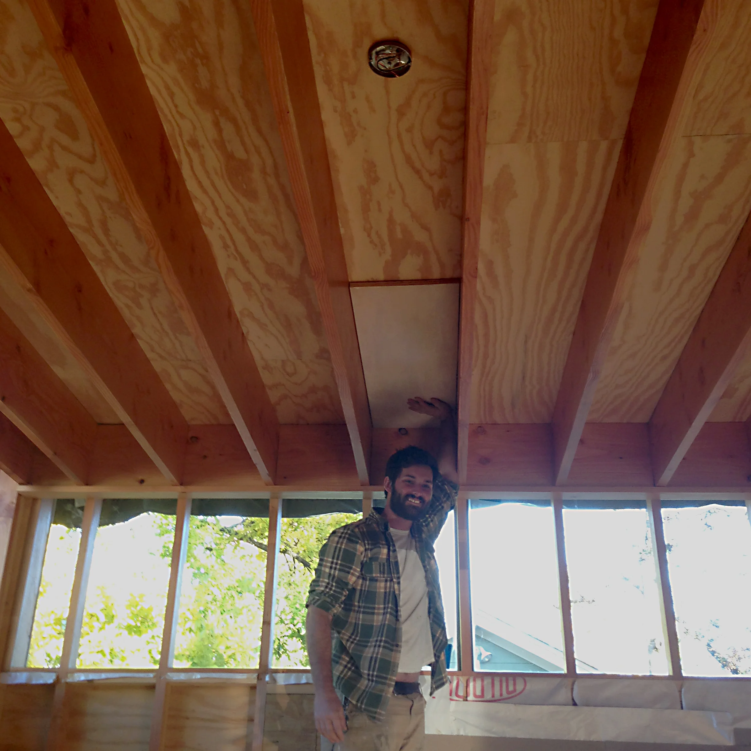 Greg Loftus holding a pickled test panel in place. In addition to being a consummate carpenter, Greg also the front man for the Austin-based band Carpetbagger .