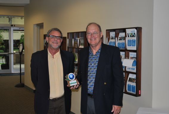Tam English, Executive Director and CEO, and Scott Strawbridge, Director of Development & Facilities, of the Housing Authority of the City of Fort Lauderdale with their 2012 Smart Growth Excellence award.