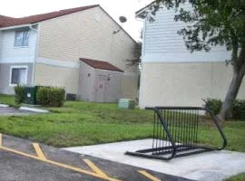 Bicycle lanes were installed on both sides and Glen Apartments installed signature bicycle racks.