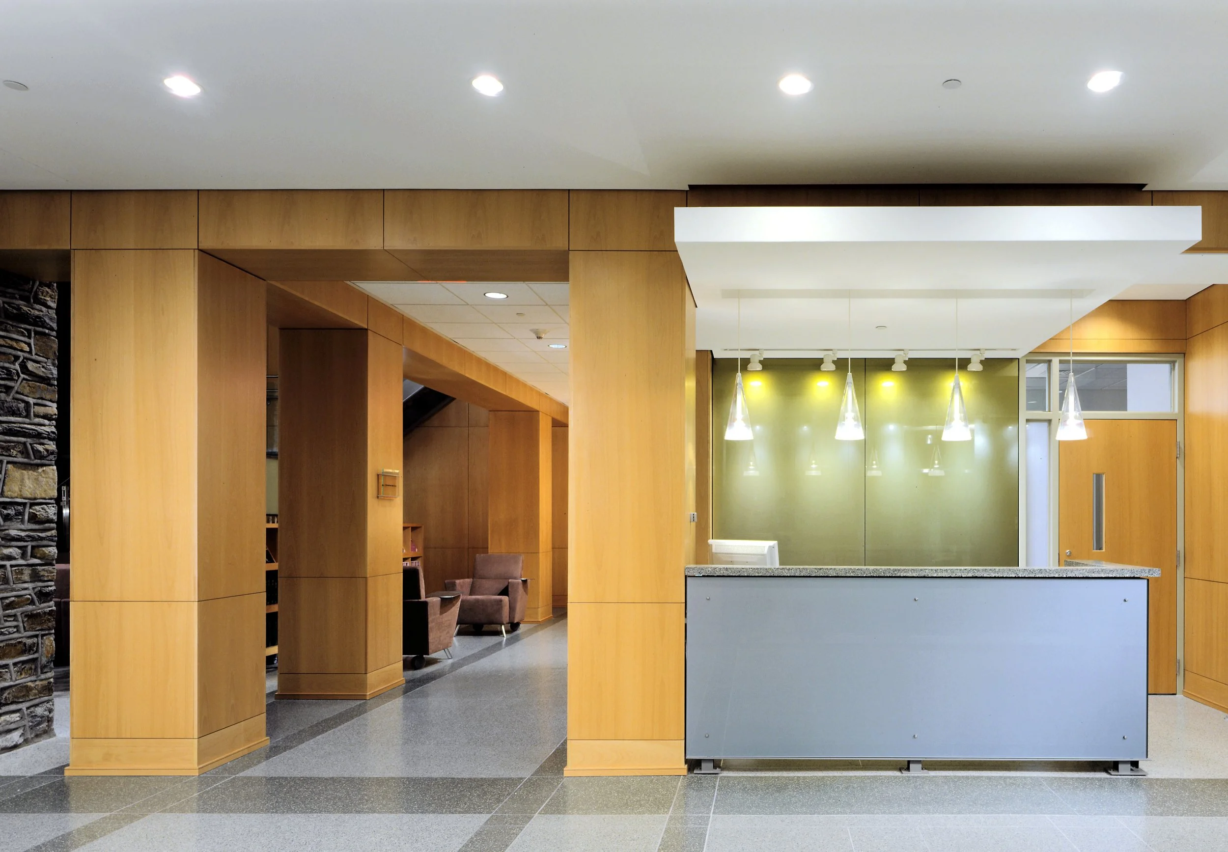 0302_01H_lobbydesk_elev.jpg