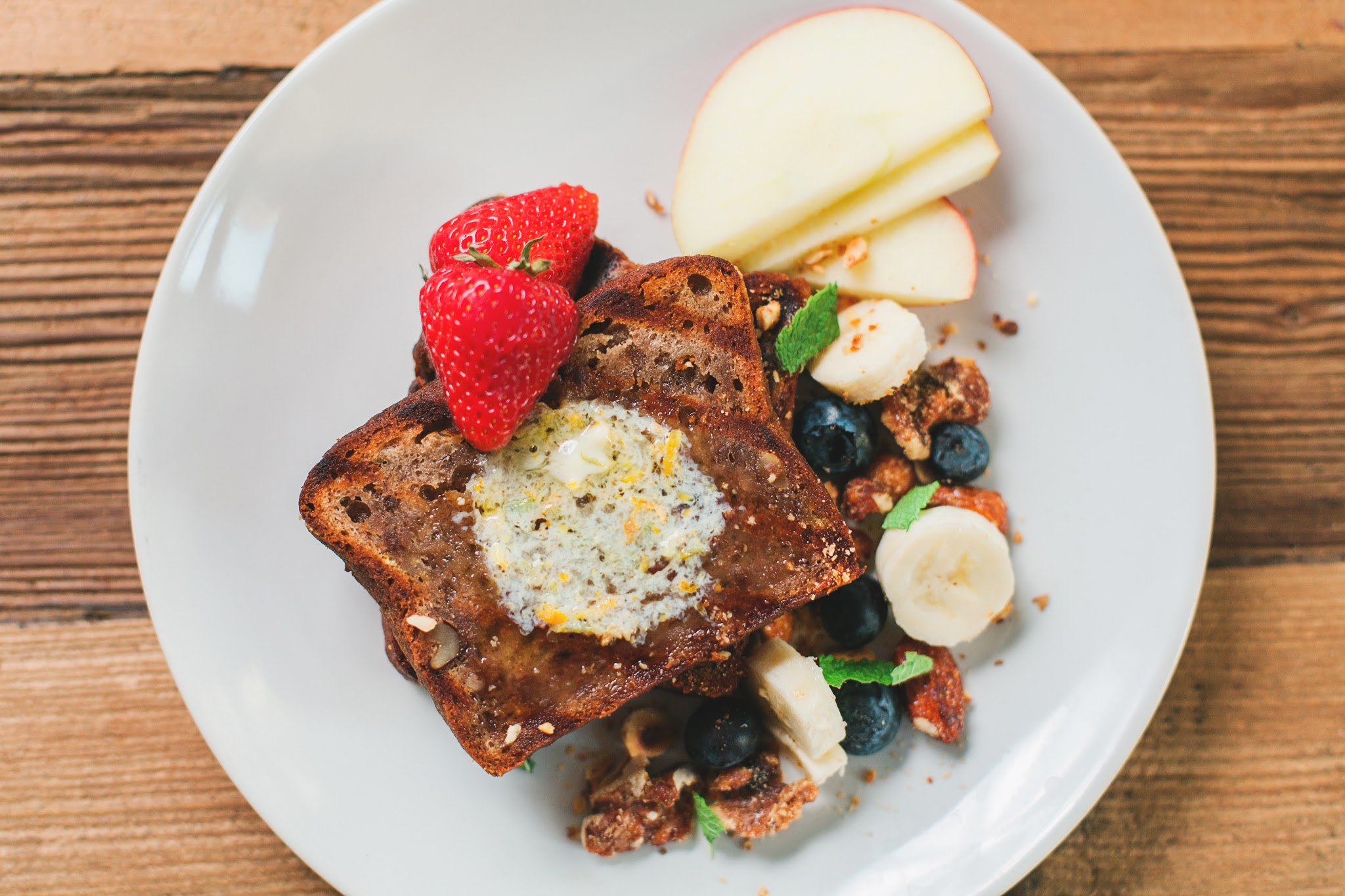Banana bread, served with fruit, granola and citrus butter....delicious!