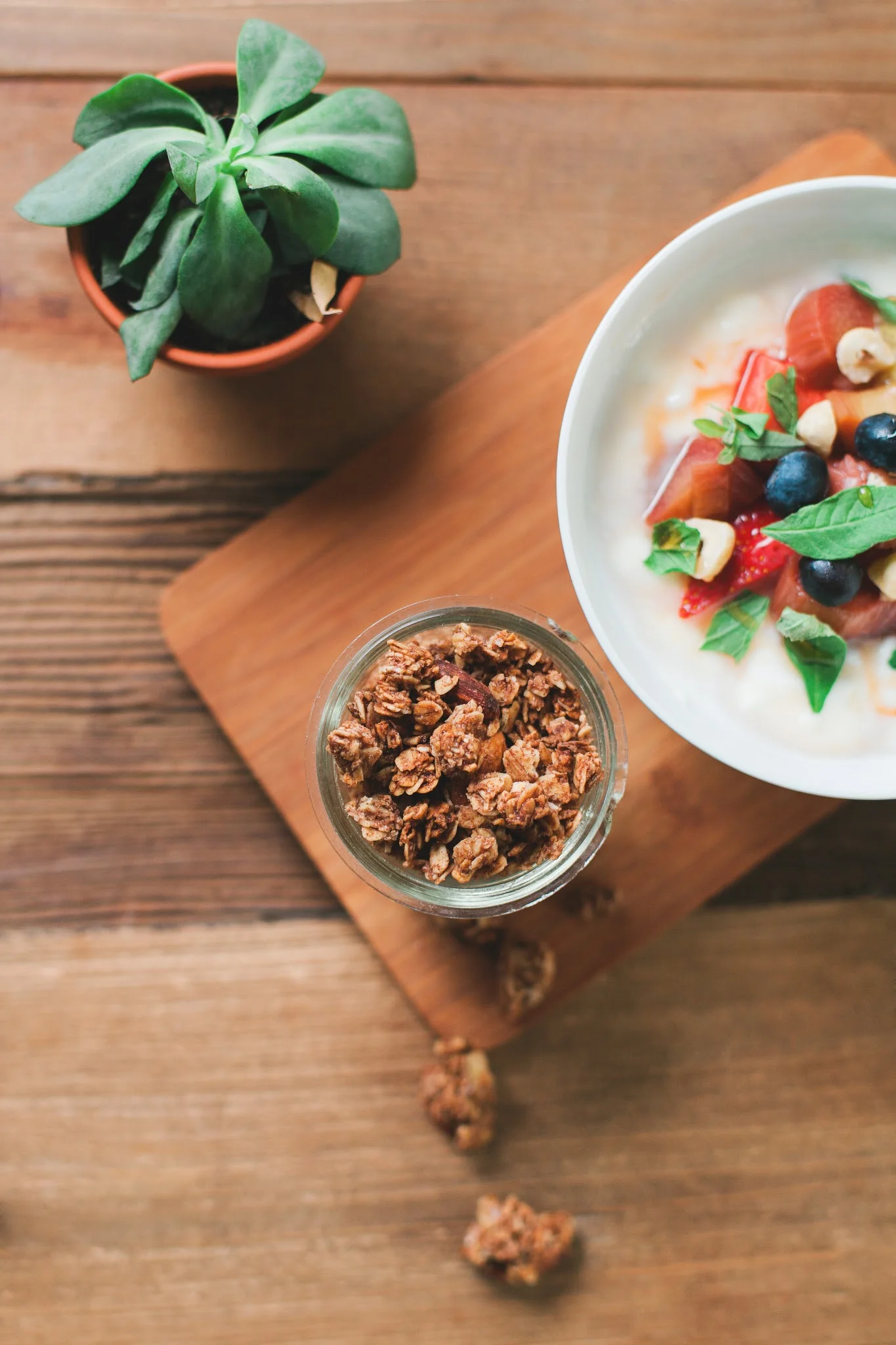 Granola with yogurt, basil, honey roasted rhubarb and strawberries...