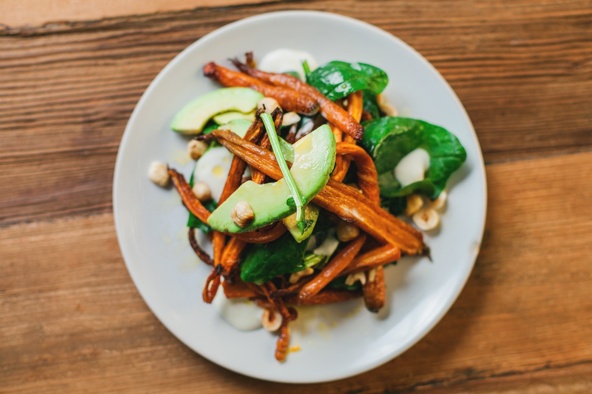 Roasted carrot salad with avocado and hazelnuts...yumm.