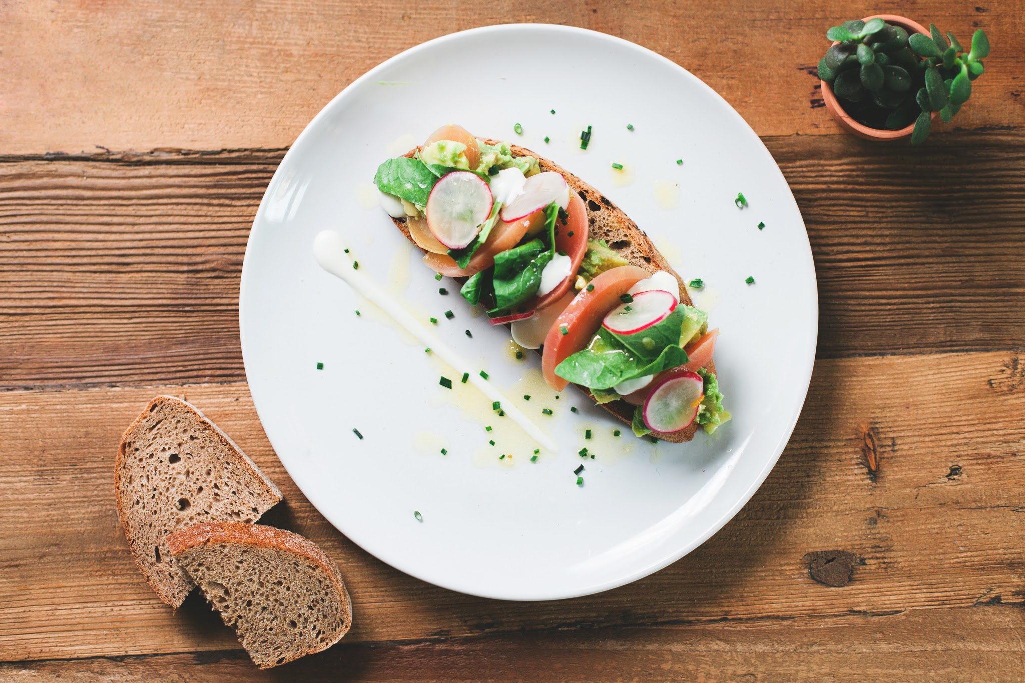 Avocado and beets on toast with whipped feta and radish....
