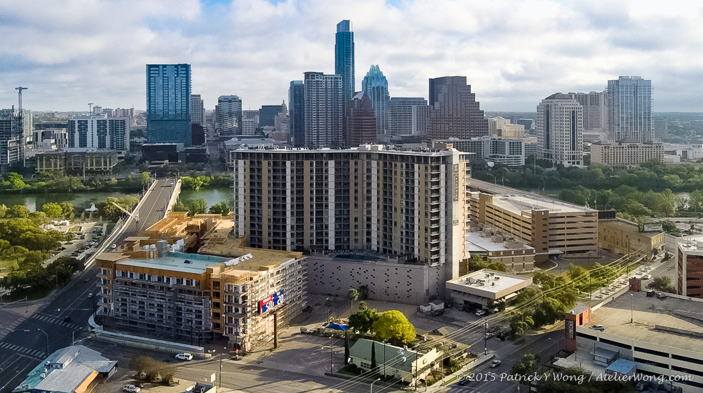 Aerial of The Catherine with the downtown Austin skyline 