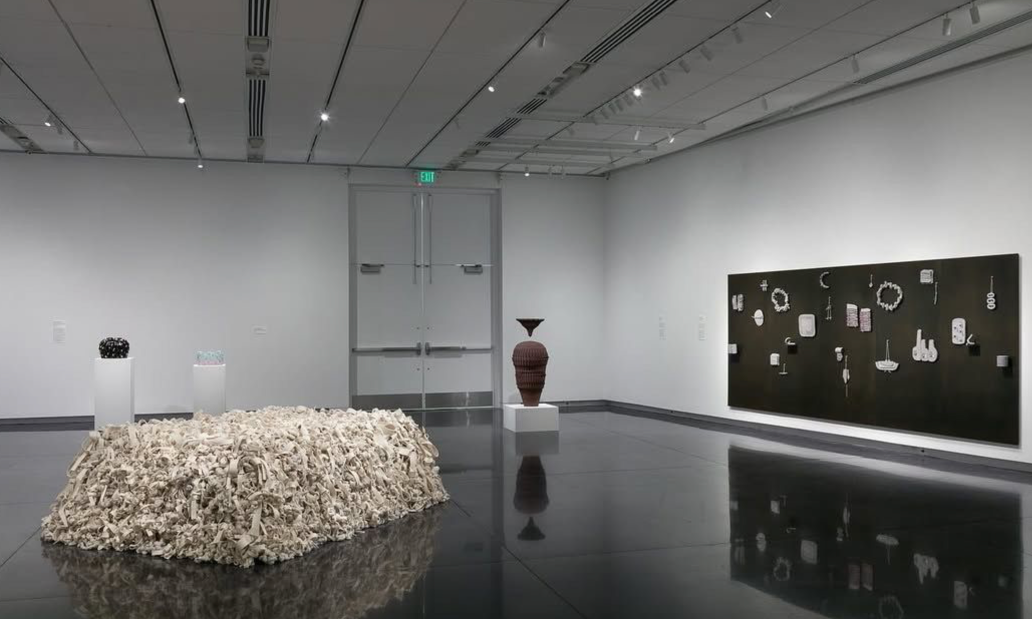  ‘Shaping Time’ exhibition at the University of Colorado - Boulder Art Museum (CUAM) , 2025, Installation view, knotted fibers on Mattress  photography by Wes Magyar 