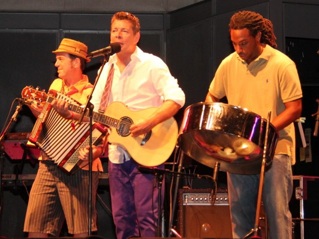Shak Shak is a Calypso and Caribbean acoustic band whose music pays tribute to classic calypso repertoire through the years. Led by Barbadian-born Roger Gibbs and multi-talented ethnomusicologist Chris Wilson, Shak Shak brings a genuine taste of the seductive rhythms and melodies that made calypso a worldwide phenomenon. Shak Shak will be playing at the Cafe one Wednesday a month, all summer long: June 15, July 13, August 10, and September 14! $10/PWYC (pass the hat) Check out Shak Shak's website: www.spiritofcalypso.com RSVP on facebook here .