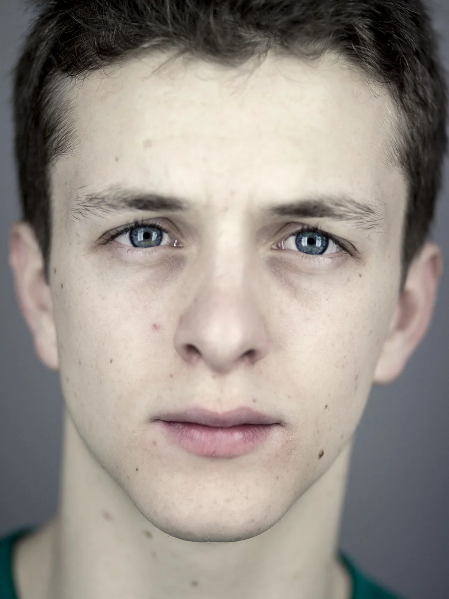 This series of Raw Portraits (Mugs) was created to show the raw beauty of humans. As people were coming in for headshots, I asked them to sit in front of the camera without having any makeup applied, without their hair being done. Then with simple post processing the texture was brought out and skin was slightly desaturated.