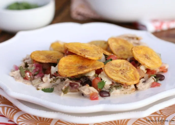 This easy Mexican-Style Casserole is great way to use leftover roast chicken (or turkey). Top it with Crunchy Plantain Chips or Tortilla chips and serve it with Cilantro Rice and a big green salad. For a simple & Delicious weeknight meal the whole family will love!