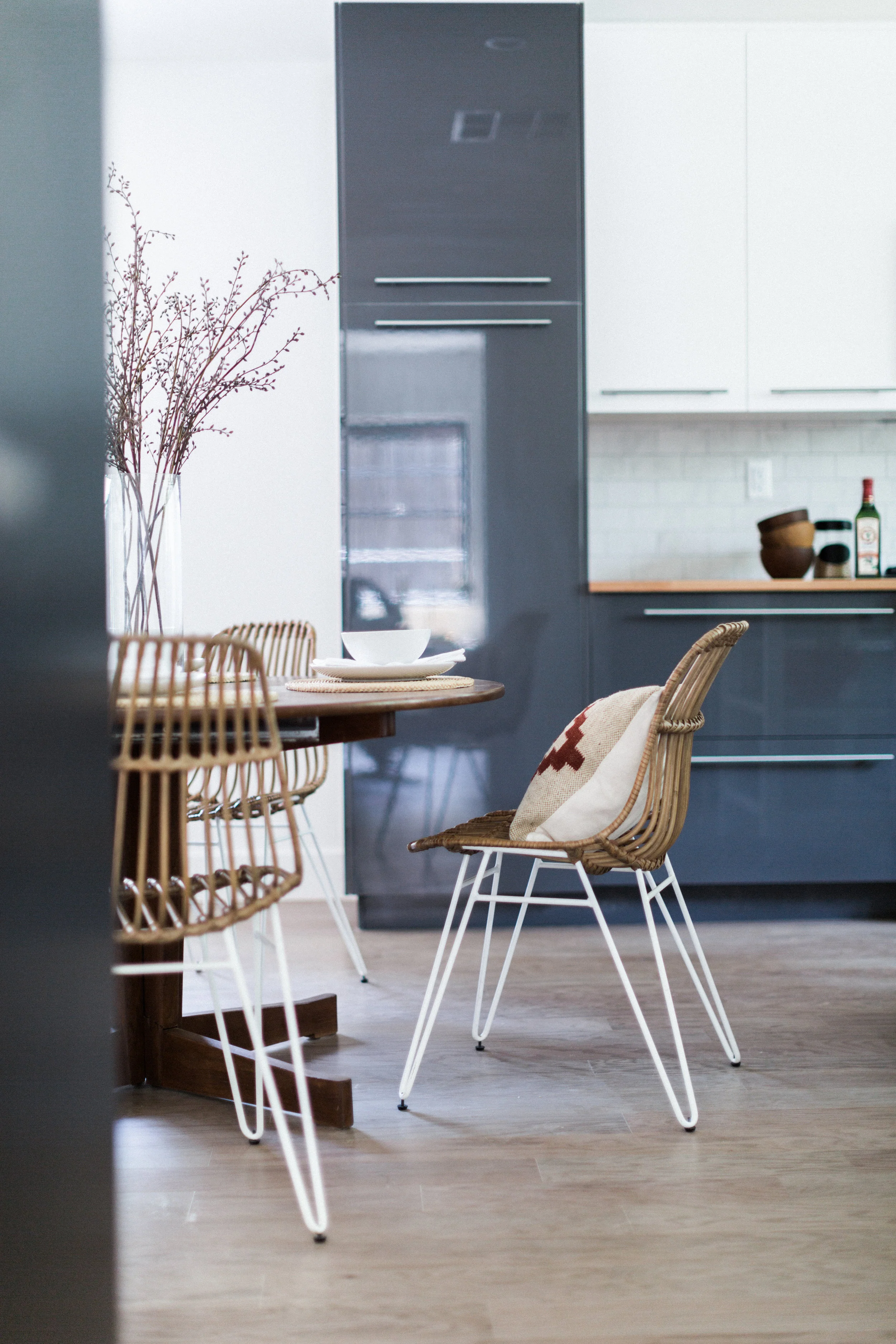 Hello, World Market Flynn Hairpin Leg chairs. We see you there looking all cute around a vintage table we found at Pepe's Furniture in Echo Park. Oh, and you're sporting a red kilim pillow, too, are you?