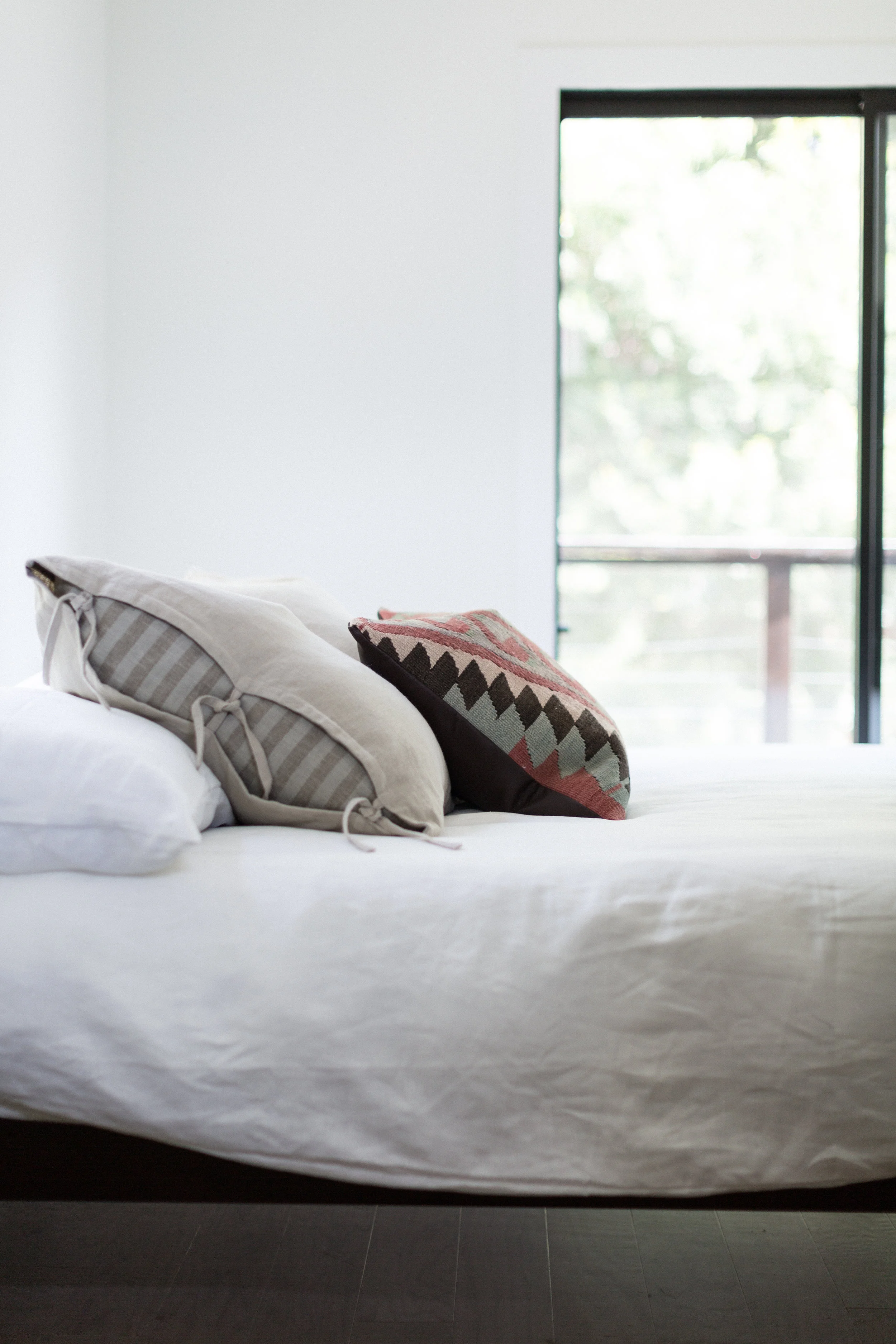 Master bedroom details, with more Etsy kilim.