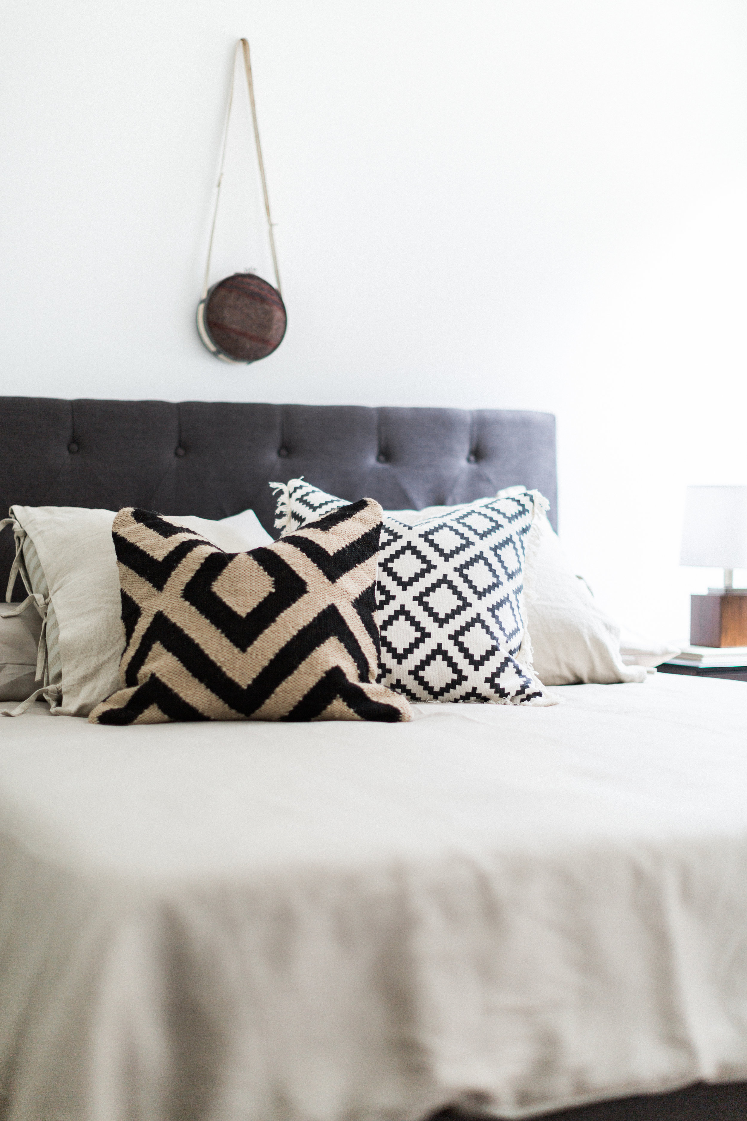 Another bedroom. This time, with a rustic camp theme. We hung a vintage canteen above the bed because, well, because we could.