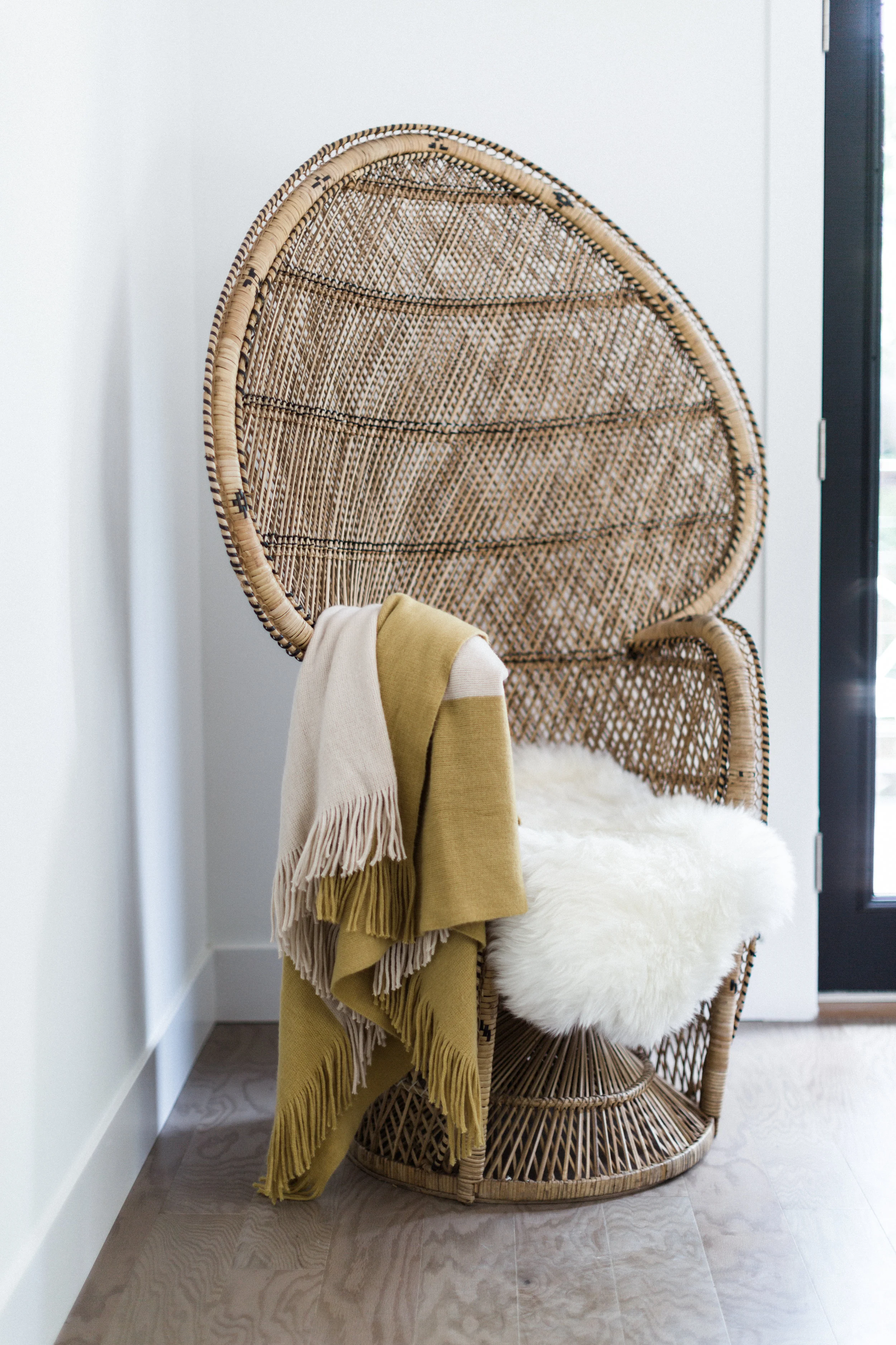 Our peacock chair looks right at home in this bedroom.