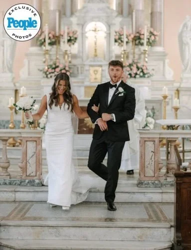 High-end-Philadelphia-wedding-ceremony-with-lush-floral-aisle-for-luxury-couples.jpg