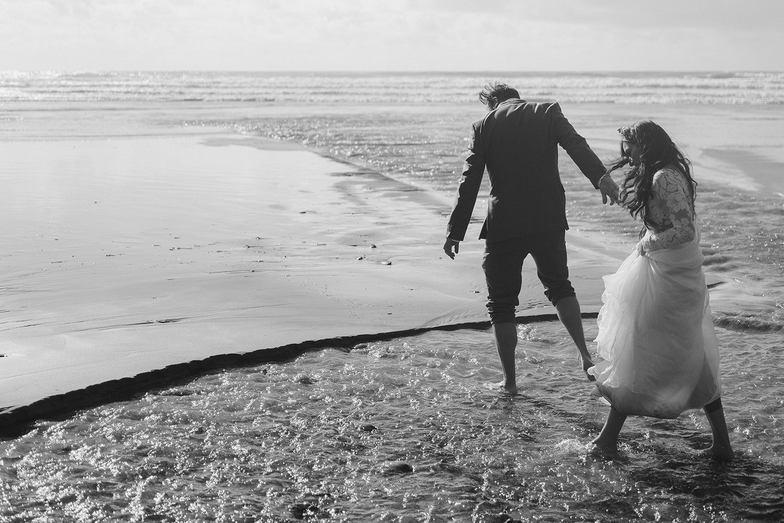 Beach elopement wedding dress by linyage - this two piece wedding dress is effortless for travel, hiking, outdoor weddings. Long sleeve vintage lace bodysuit and bias cut organza skirt by Linyage.