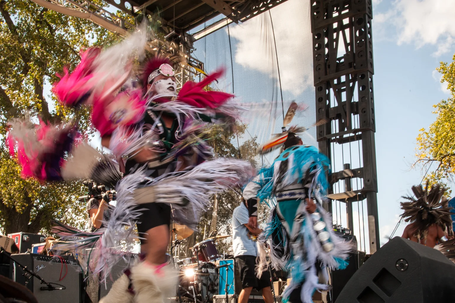   Frank Waln performs with Sampson Brothers at the Harvest the Hope concert.     