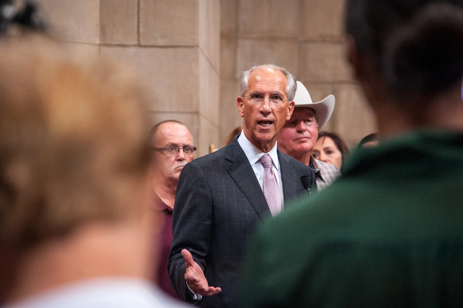   Attorney, Dave Domina, answers questions during the press conference held at the Capitol on September 5, 2014.  