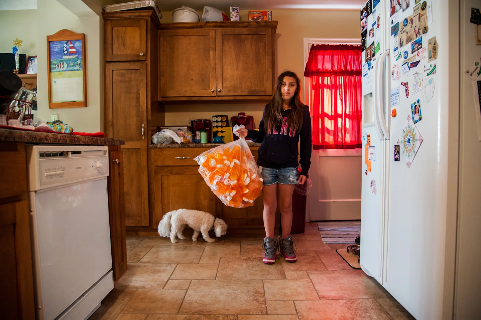  Jenna holds a bag of empty prescription bottles from the last six months.&nbsp;  Medicaid is vital to the wellbeing of many Nebraskans with disabilities. "Medicaid Works" is intended to promote an accurate picture of the many ways this essential pro