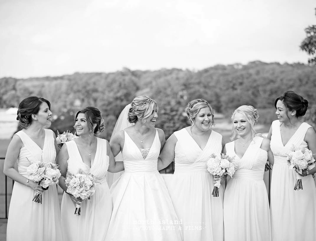 "I used Jessica and her team for my hair for everything from my engagement photos to my bridal shower and then my wedding. Everything was amazing! Jessica did an amazing job for my engagement photos. She understood my vision and made it a reality. After that, she spent so much time with me for my hair trial. She is calm and kind and again, knew exactly what I wanted and created the hairstyle I was hoping for. She also spent the same time with my mom, making her feel so special! For my bridal shower, I overslept and missed my hair appointment. I was freaking out! Sandra calmly called me and somehow made other arrangements to get my hair done beautifully in a short amount of time! Thank you! And finally for my wedding Jessica and Sandra did everything I asked for and more. They were great to work with. Jessica did my hair and my mother's. We have never had so many compliments. It came out so well! She was on time and explained everything to me and my bridesmaids. Gianna and Nikki did the hair for my bridesmaids. Everyone was so pleased. They said it was the best wedding hair they have ever seen. Gianna and Nikki were on time and fast! They finished at the exact time we had discussed and had time to do any touch ups or address any concerns. Gina met us at the venue to do touch ups between pictures and the ceremony. She was so calm and sweet! Talk about a full service vendor!!! From beginning to end - AMAZING! " -Corrine