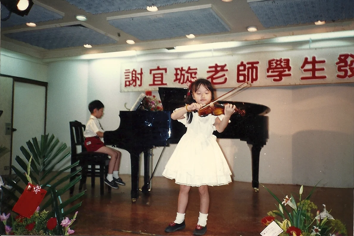 Debut at 7! With accompani-- I mean, pianist Tien-Yo Wu (older brother)