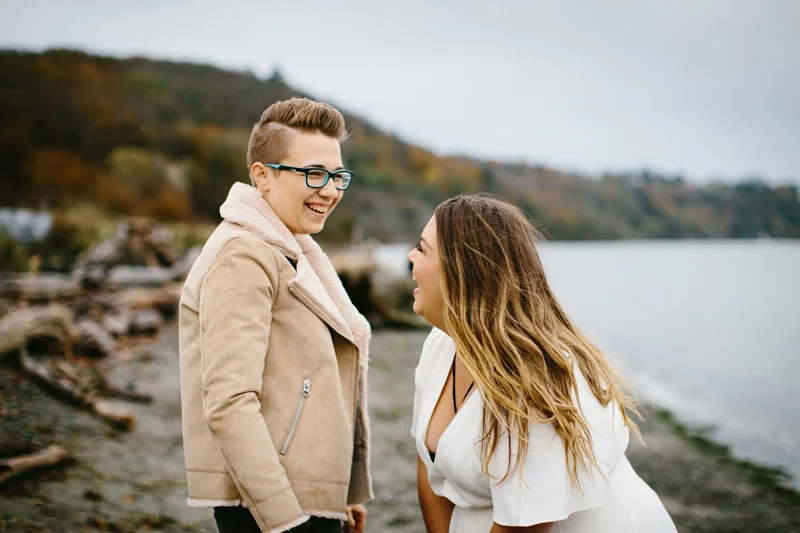 laughing couple at discovery park beach