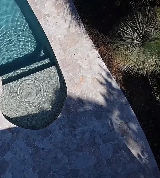 A pool with personality &mdash; curved lines and crazy paving that echo the natural bush surrounds. @armstoneau @traydpoolfinishes 
#pool #poolscapes #escape #poolandspa #home #retreat #buildingprojects #projects #sutherlandshire