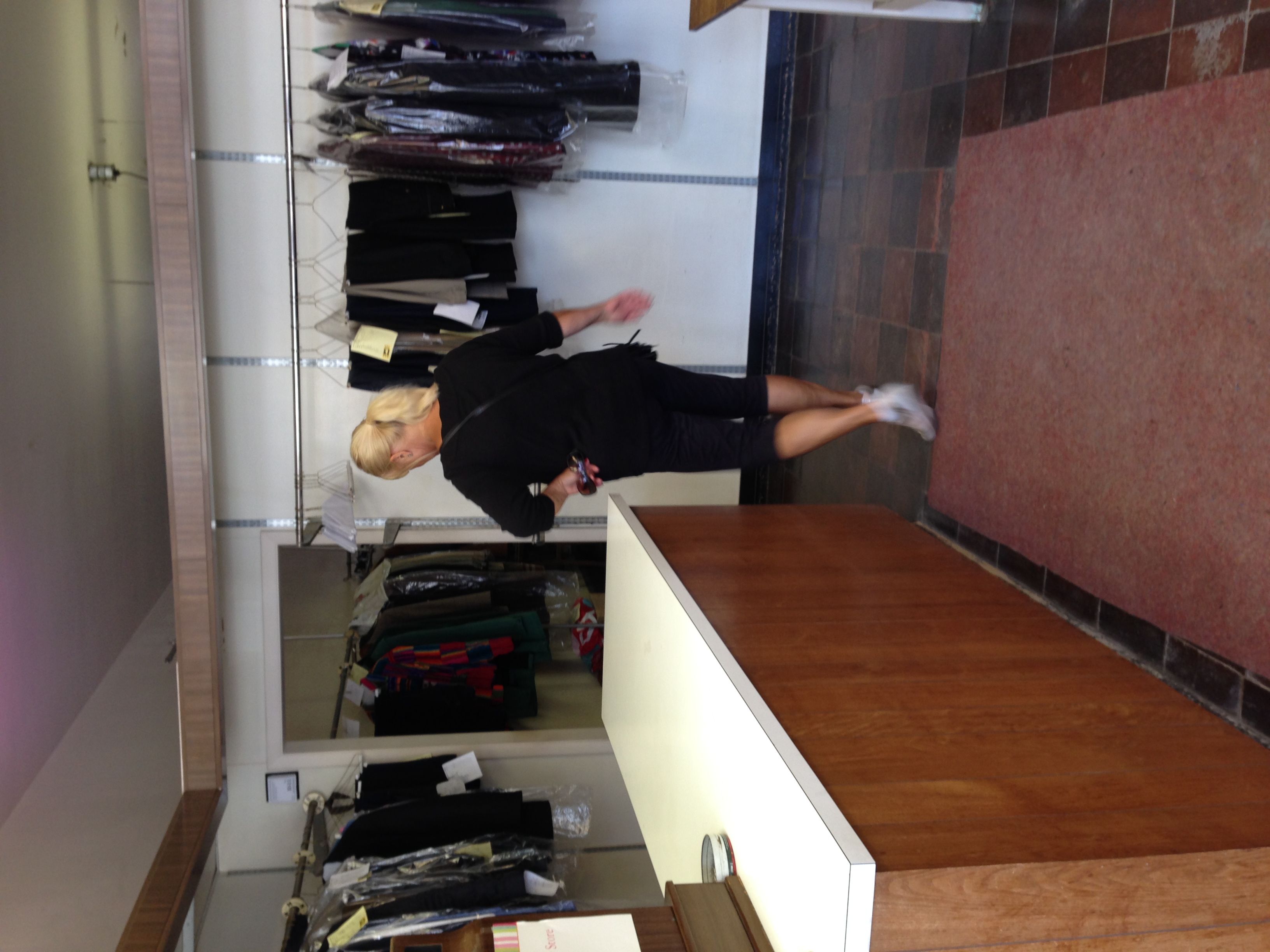My lovely mother in the front of the store, pre-renovation.
