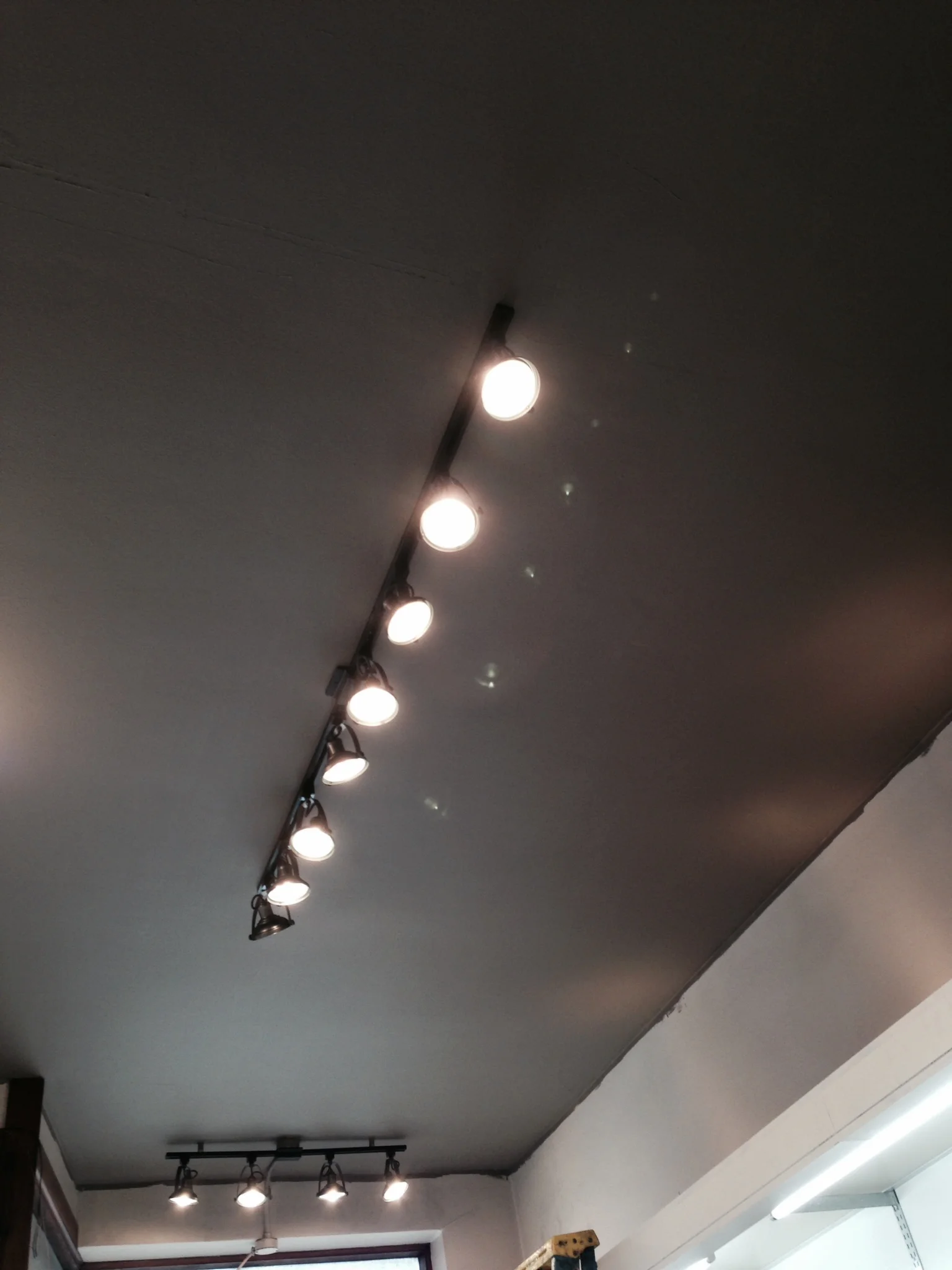 the new lights and the ceiling paint! loving the warm feeling you get from just these two changes!