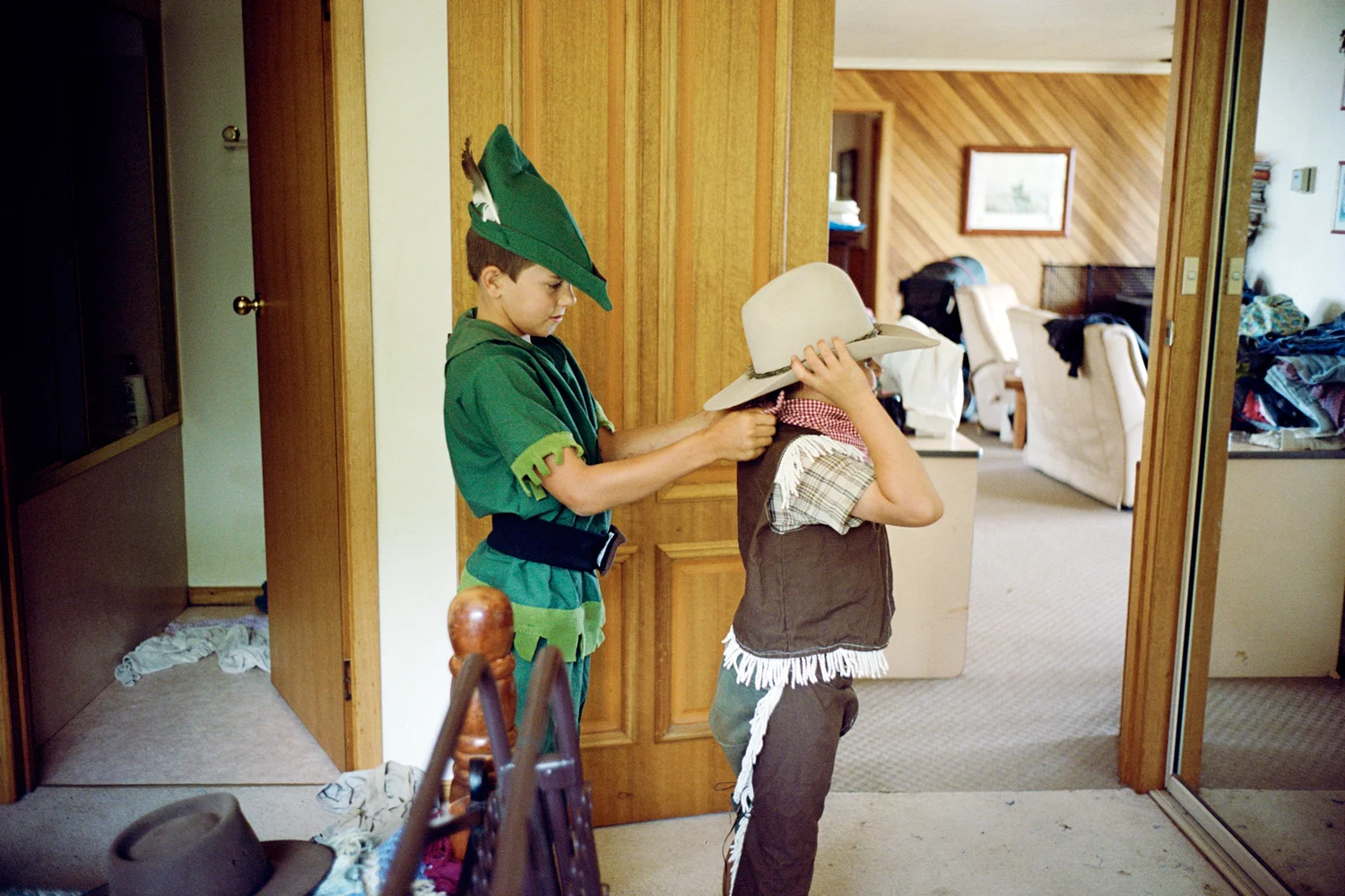 "We have to trust that kids will learn. You can't stop them learning, they are born with questions, even if your home life is stagnating their curiosity will drive you on into some new realm of investigation." Hudson and Joseph Milburn playing at home. Irishtown, Tasmania.