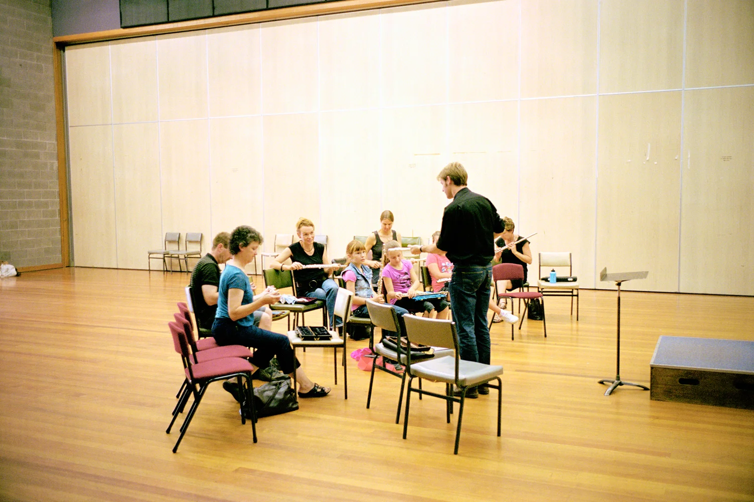 "Our children are given the opportunity to meet people who may not be their age but will share their interests, which is more reflective of adult life." Tara and Will Ulbrich at the University of Tasmania community band practice. Launceston, Tasmania.