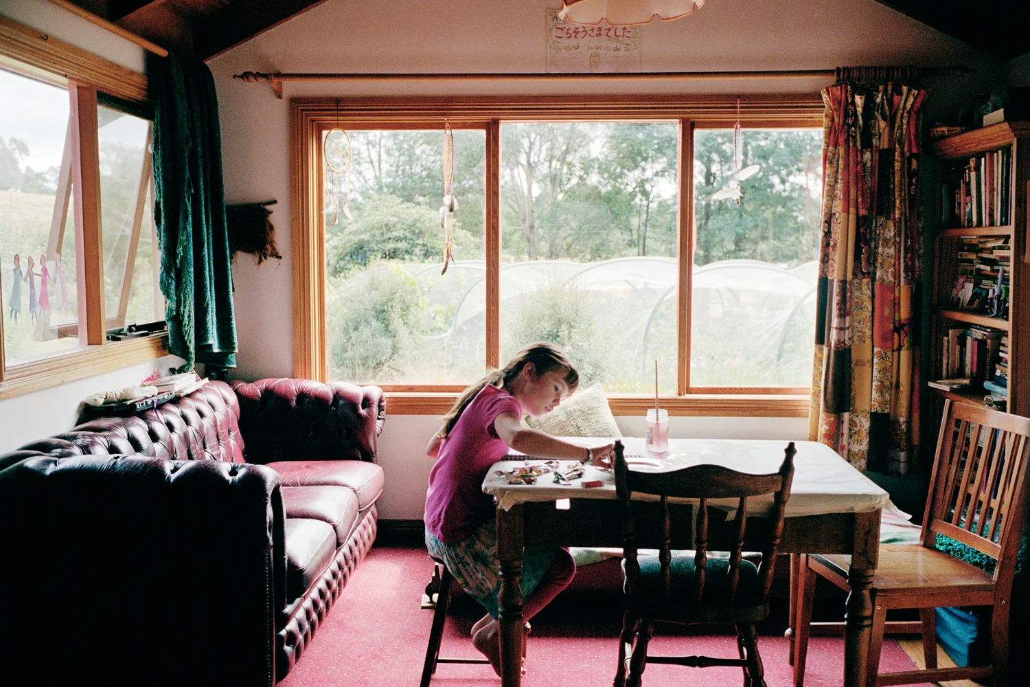 "We are looking to create an environment that nurtures the development of the whole child so music and art play a large part in our lives. Modern education has had to compromise in these areas that we don't need to at home." Will Ulbrich painting at home. Reedy Marsh, Tasmania.