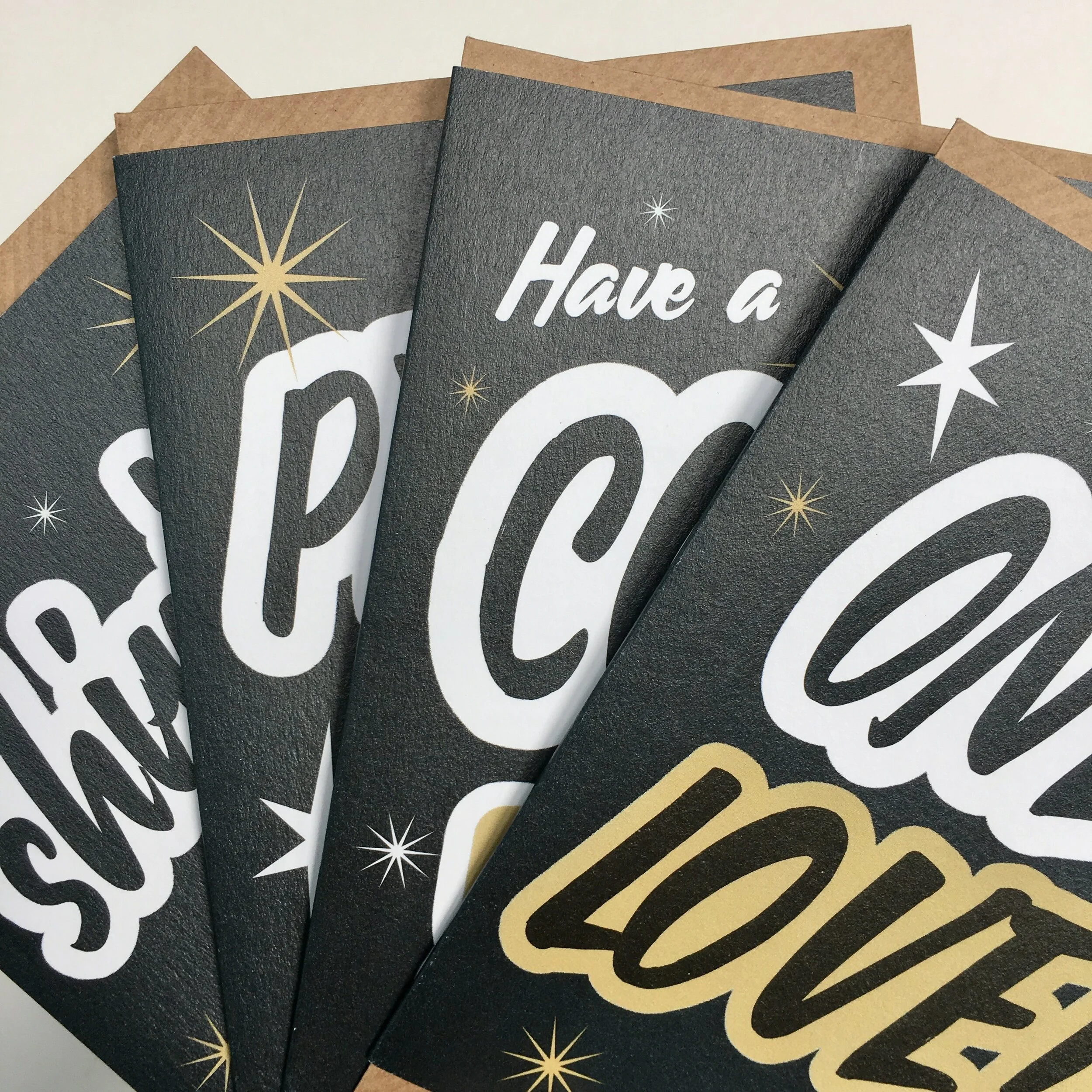 Typographic slogan Xmas card set by Lou Boyce